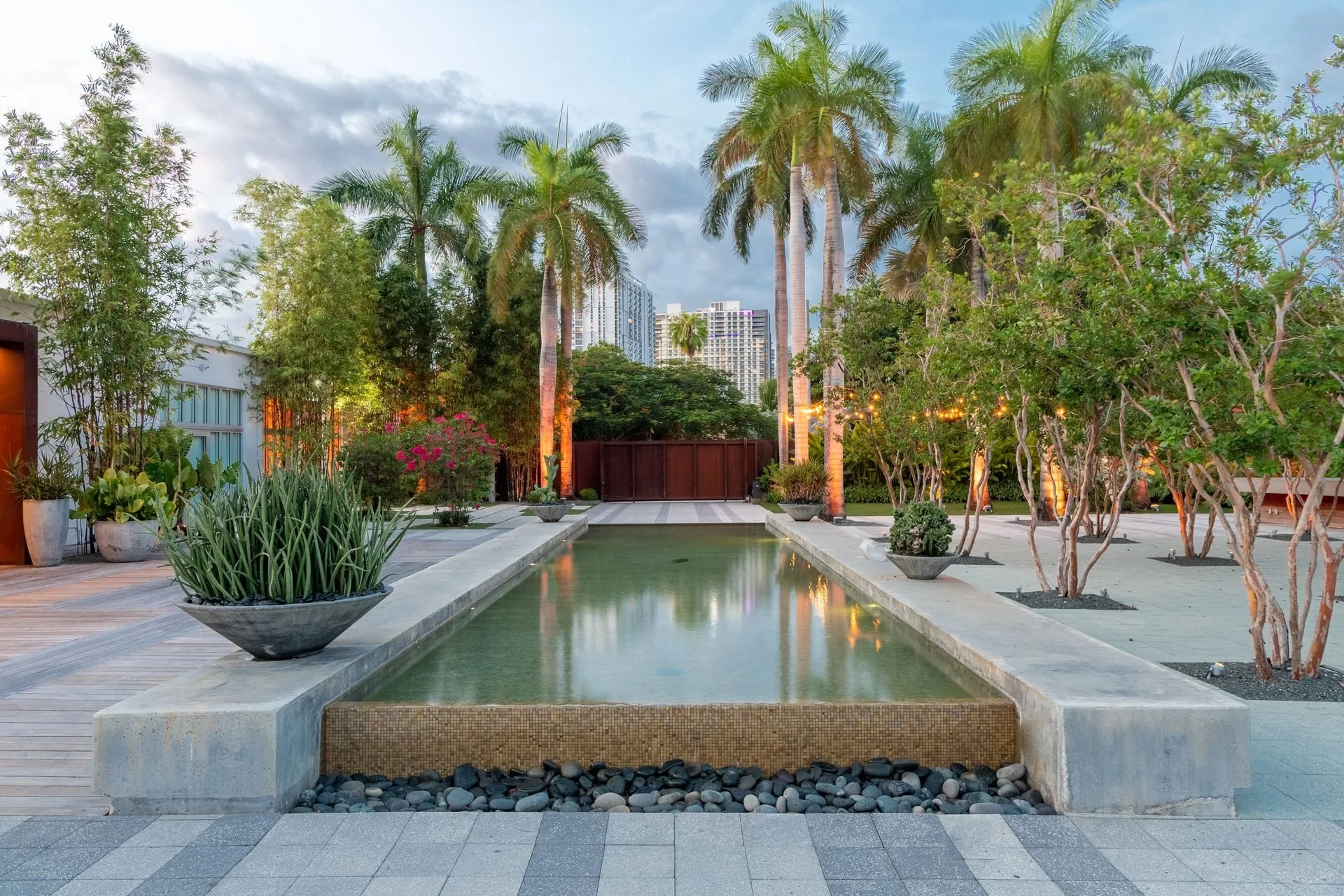 Reflecting pool and tropical gardens at The Sacred Space Miami near Wynwood.