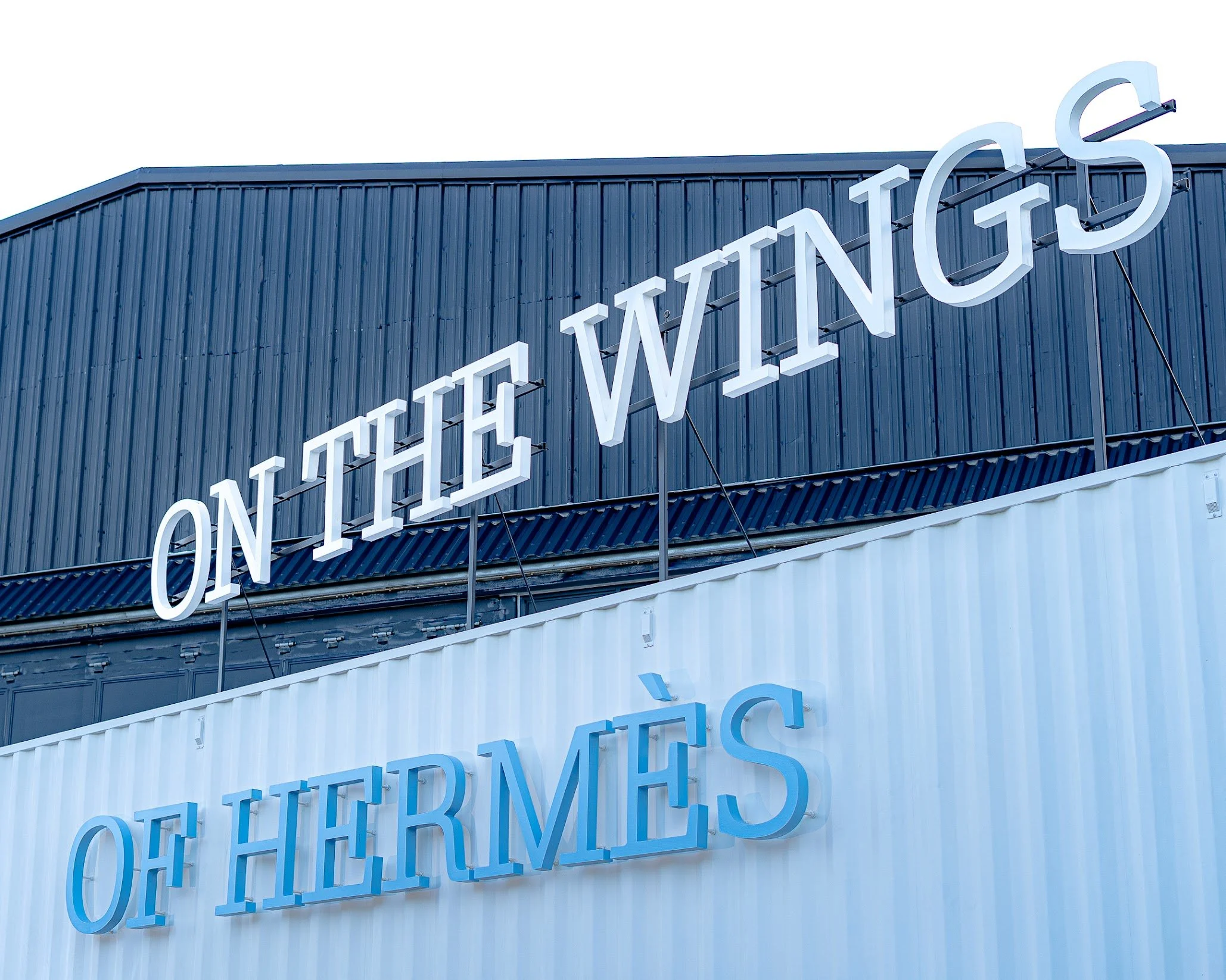 Exterior of The Hangar at Regatta Harbour during the On the Wings of Hermès Miami activation.