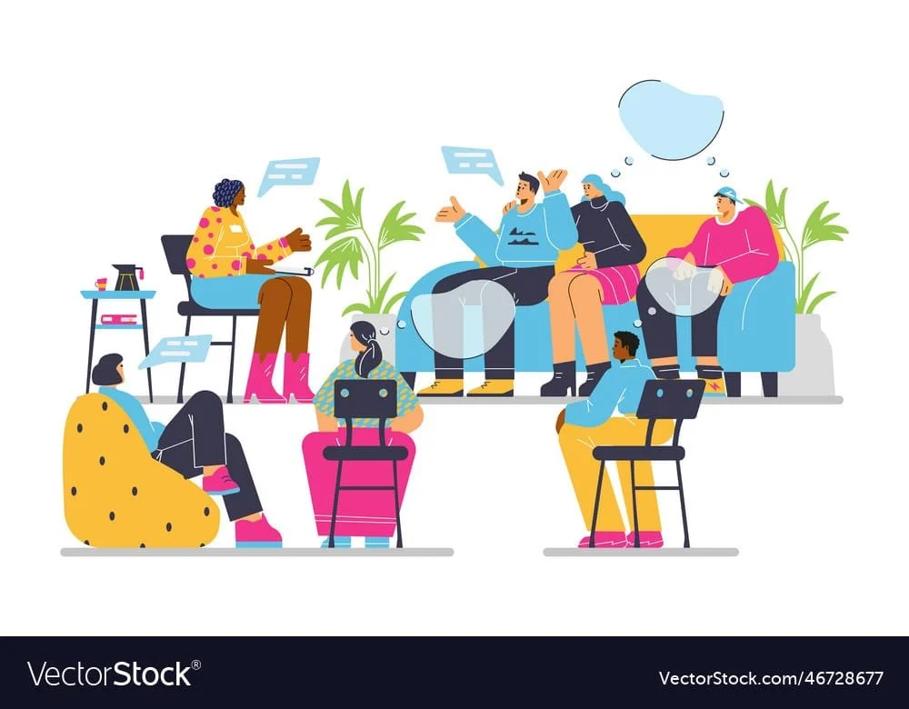 Eine Gruppe von Menschen bei einer Therapie- oder Beratungs in einer Wartezimmer-Umgebung, die sich unterhält.