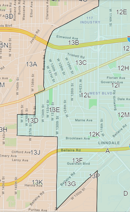 Map showing neighborhood divisions with street names, labels for streets, avenues, and park areas in a city.
