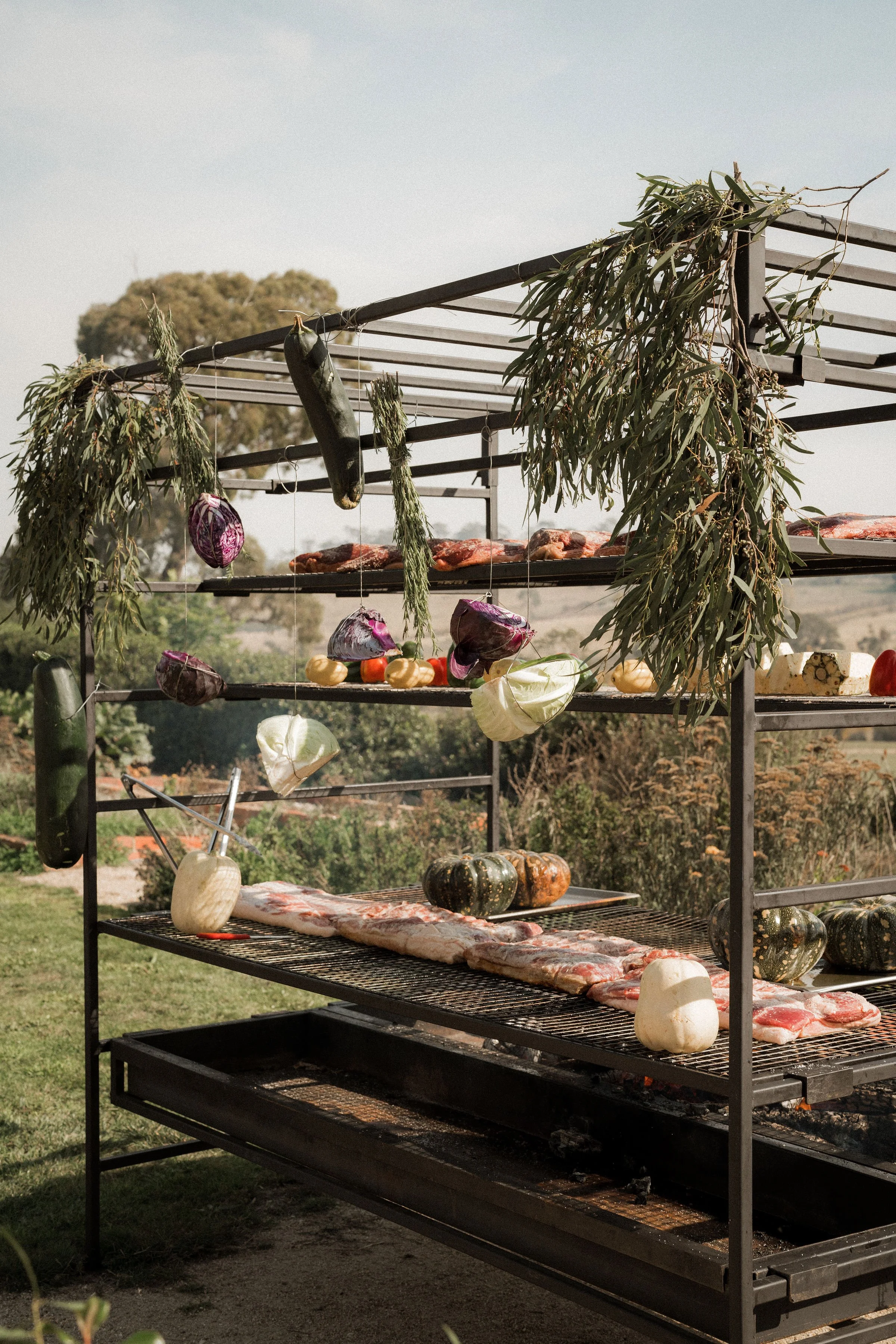 Fire catering setup at Great Ocean Road farm wedding venue by Grilled and Gathered Co