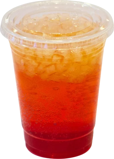 Red Bull Kicker energy drink over ice with red and orange layers, served at Pit Stop Cafe for a bold caffeine boost