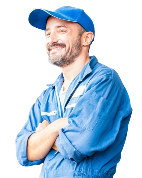 Smiling auto technician in blue work uniform representing Pit Stop Cafe’s automotive-inspired, workday fuel brand