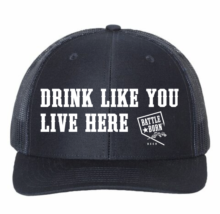 "Drink Like You Live Here" Trucker Hat | $19.00