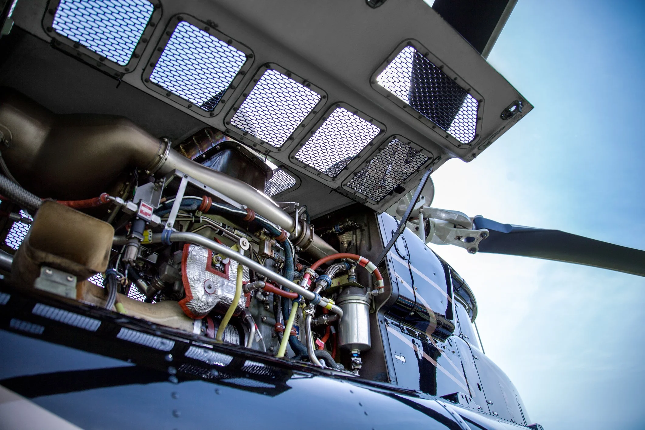 New Zealand Helicopter pre purchase inspection Bell 407 helicopter with engine cowl open depicting a pre purchase or pre buy inspection