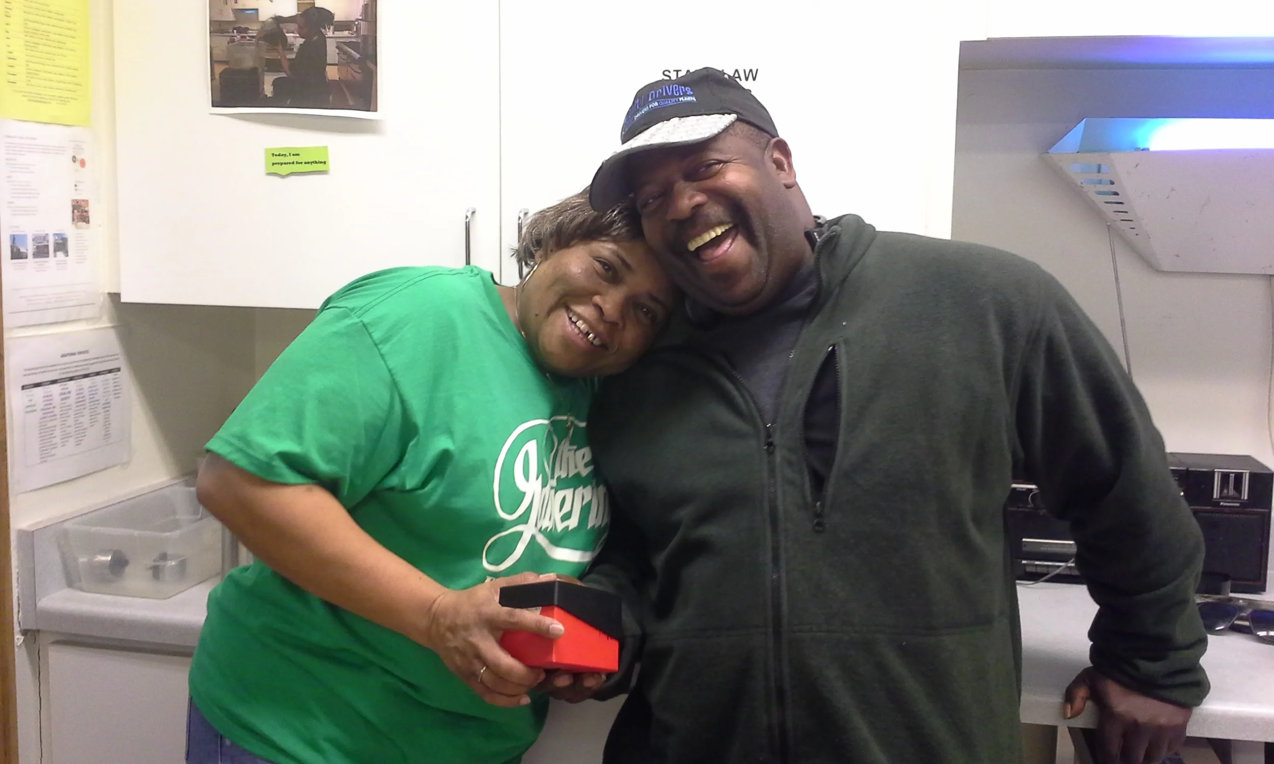 Breakfast coordinator, Angela, presents Ray with the George Greene Award