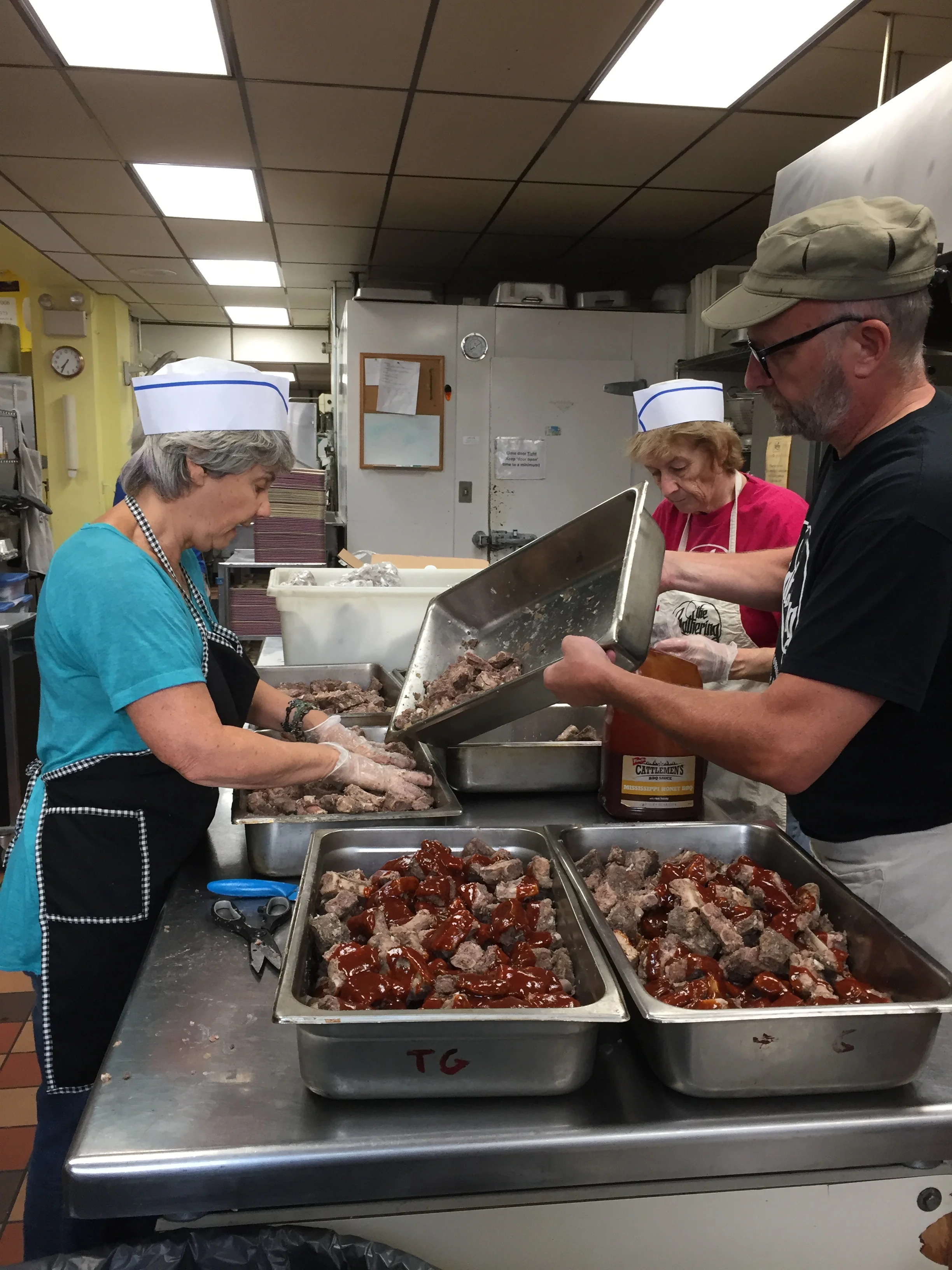 First Saturday Cook Group preparing the Saturday Lunch at State Street