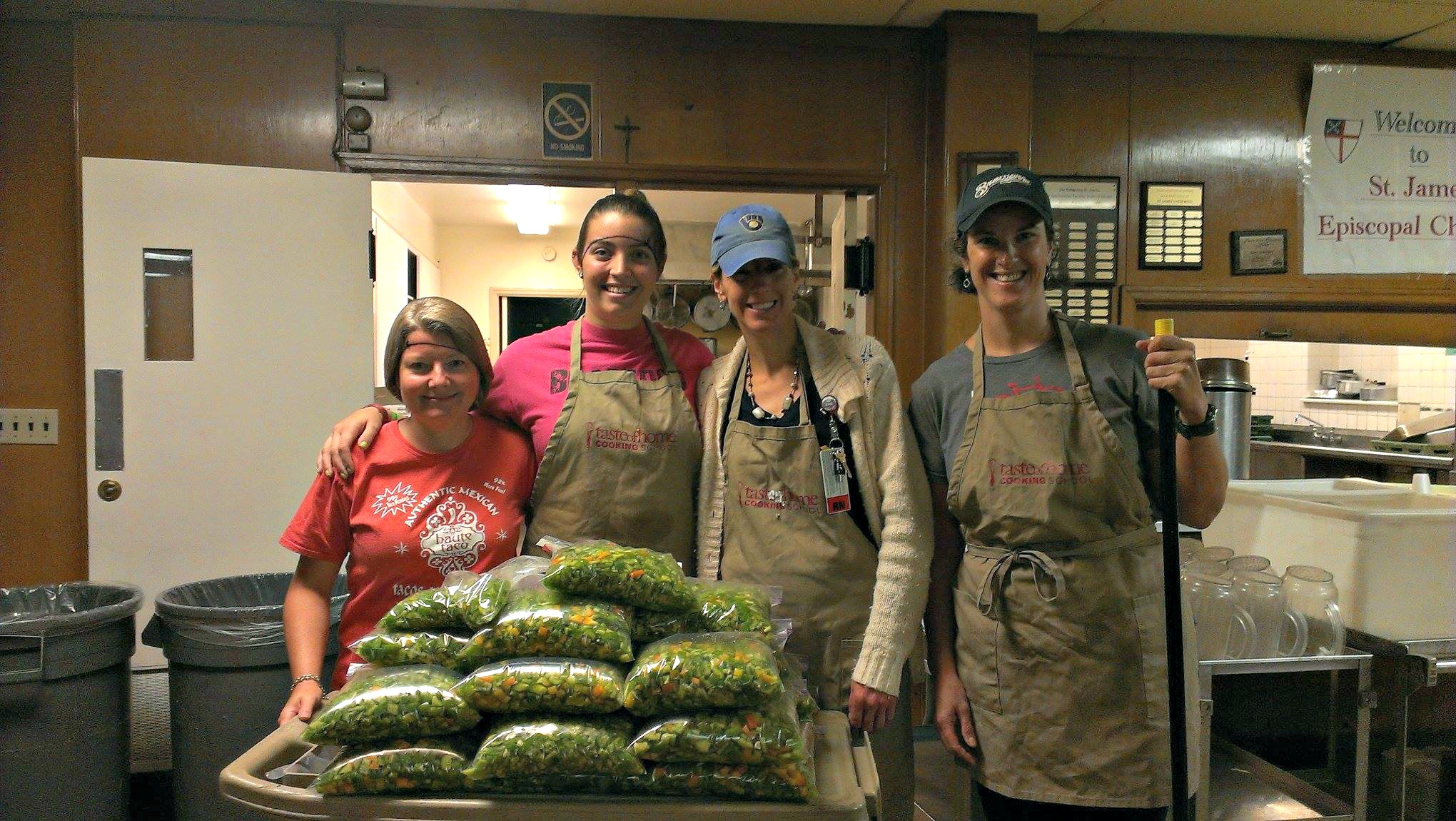 Dora and returning produce project volunteers after a pepper-filled session