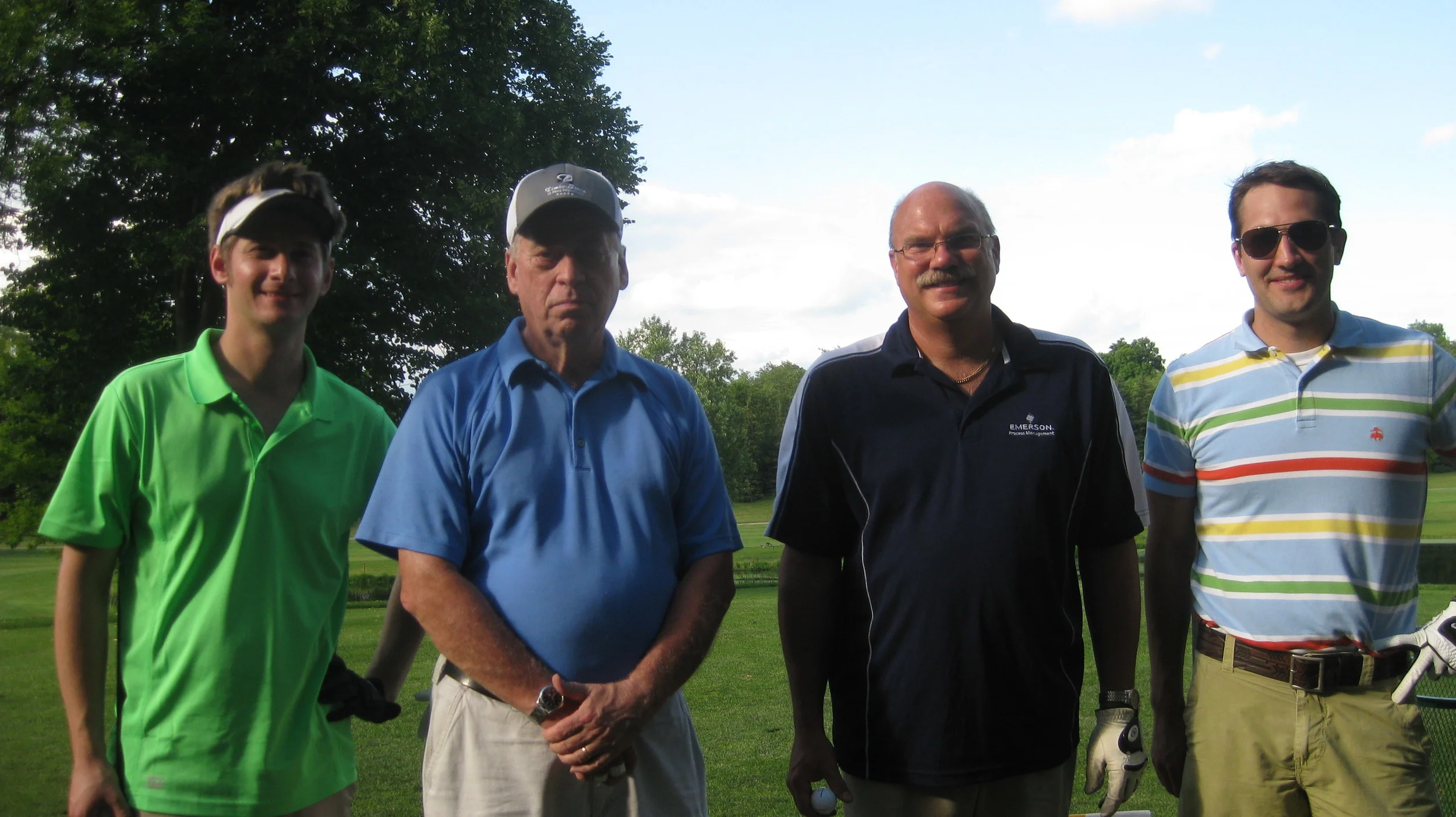 Greg, Ben, Mike and Tom - Showing off their golfing prowess