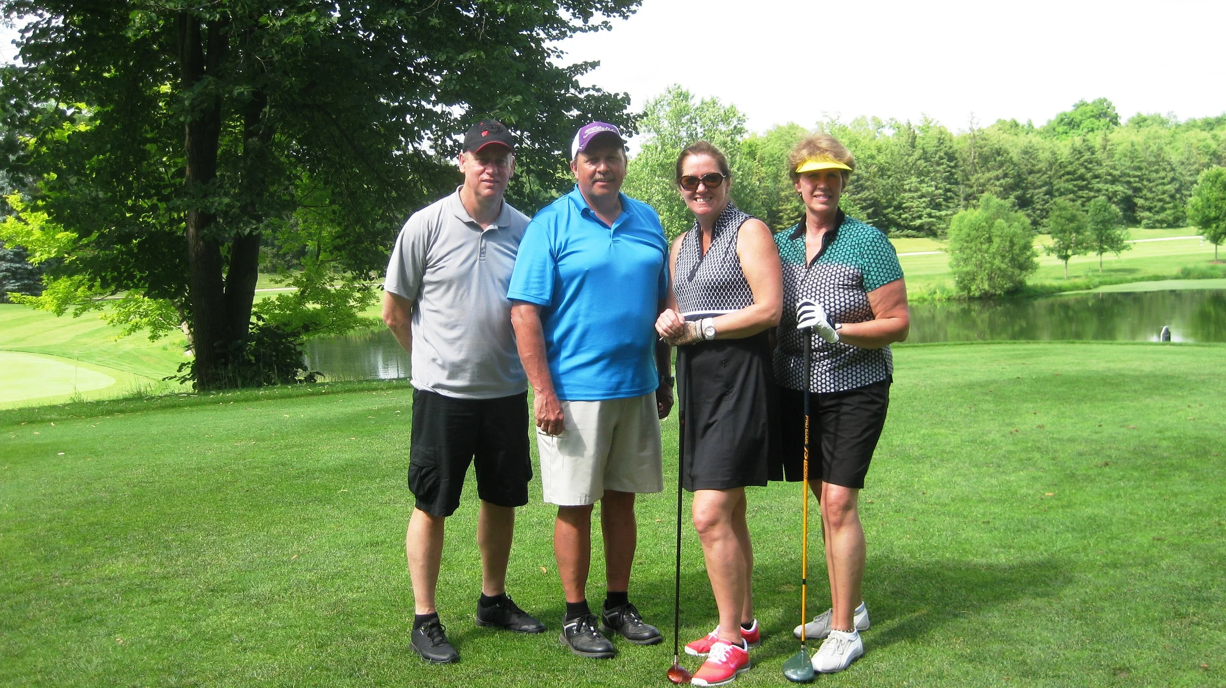 Ray, Jim, Lisa and Deb - go for the hole-in-one