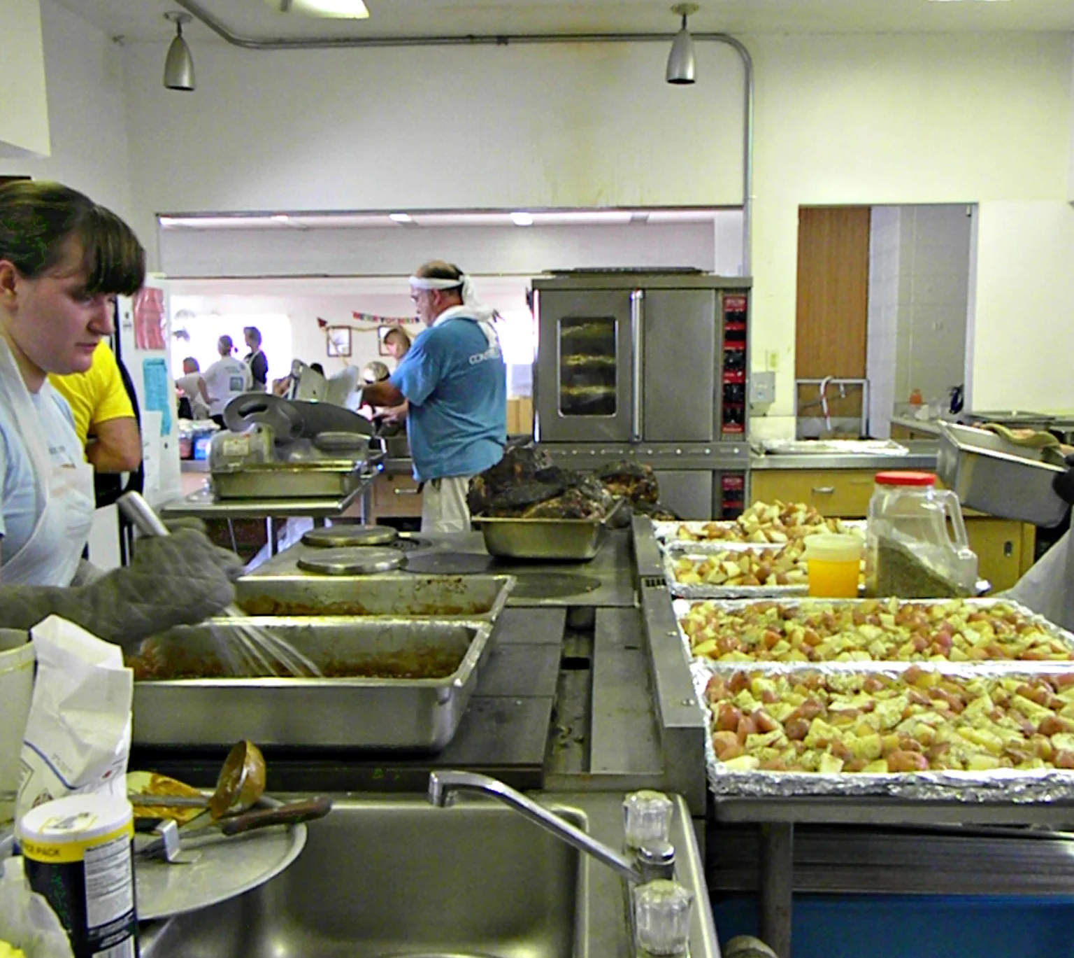 Cooks prepare over 150 lbs. of potatoes