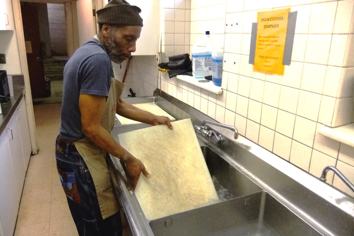Curtis lending a helping hand in the Gathering kitchen