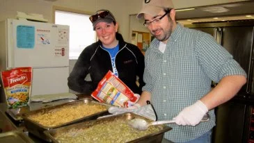 Volunteer Cooks preparing green bean casserole at the South Side