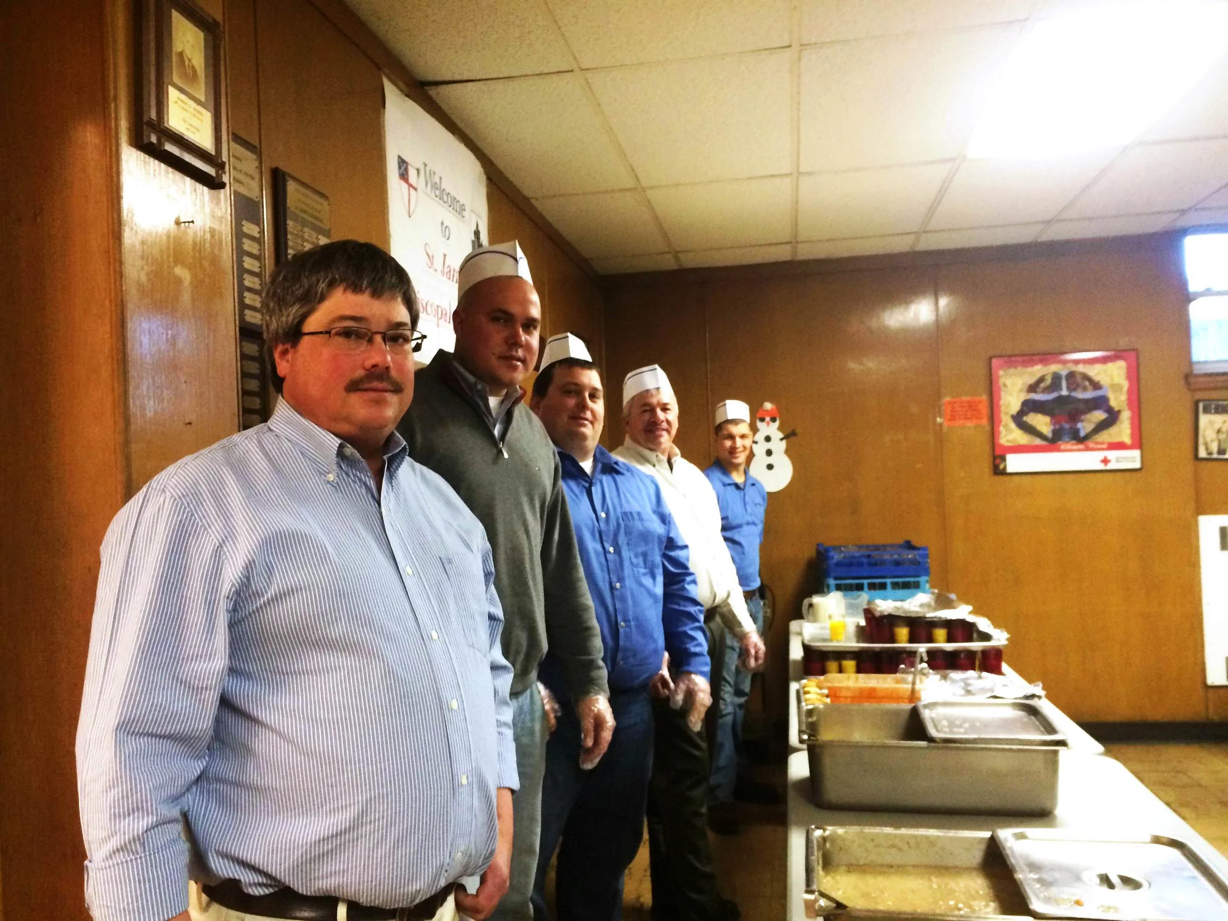 CG Schmidt volunteers in the breakfast serving line