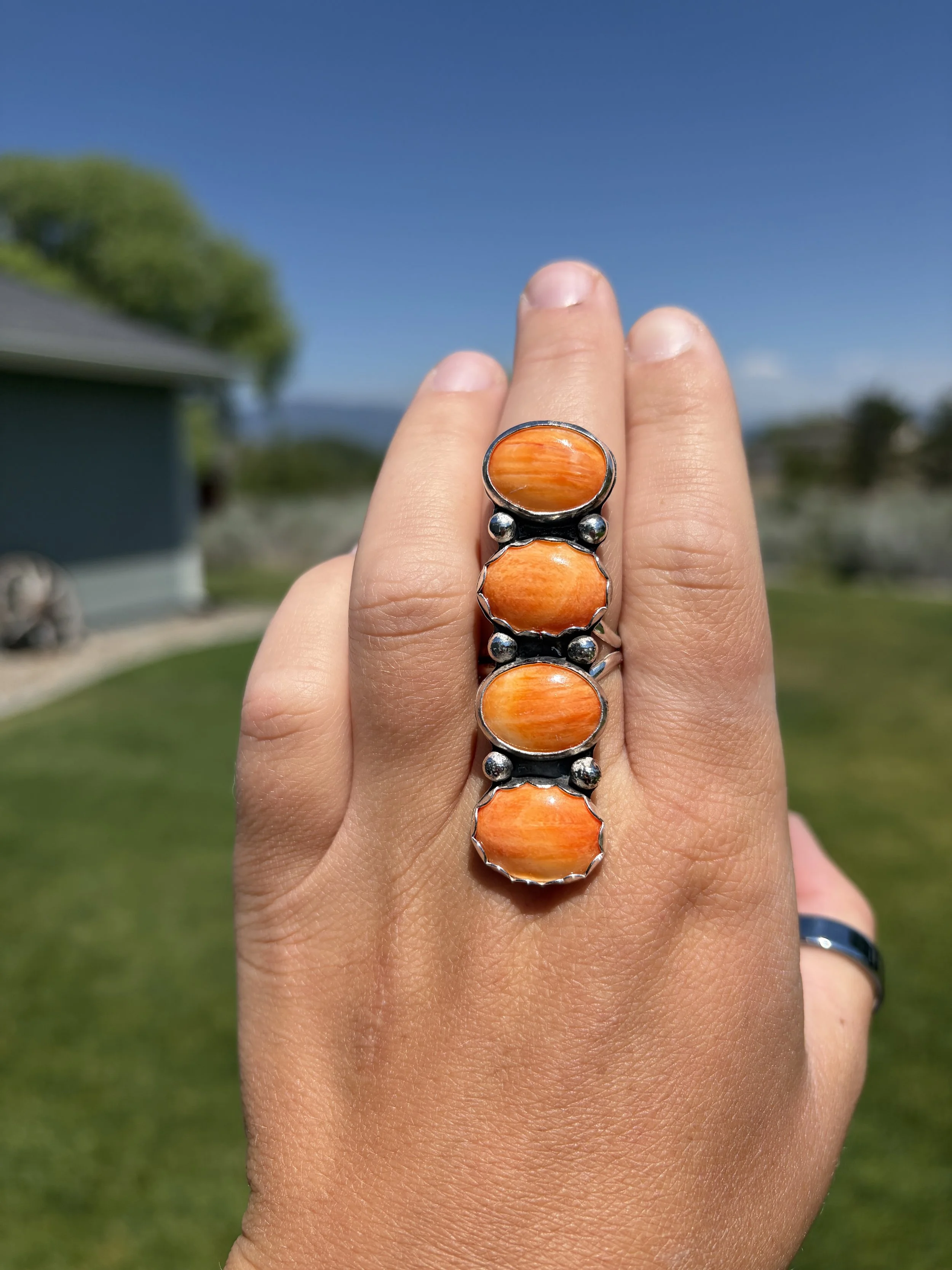 Orange Spiney Oyster crawler ring. Adjustable size. $225. 