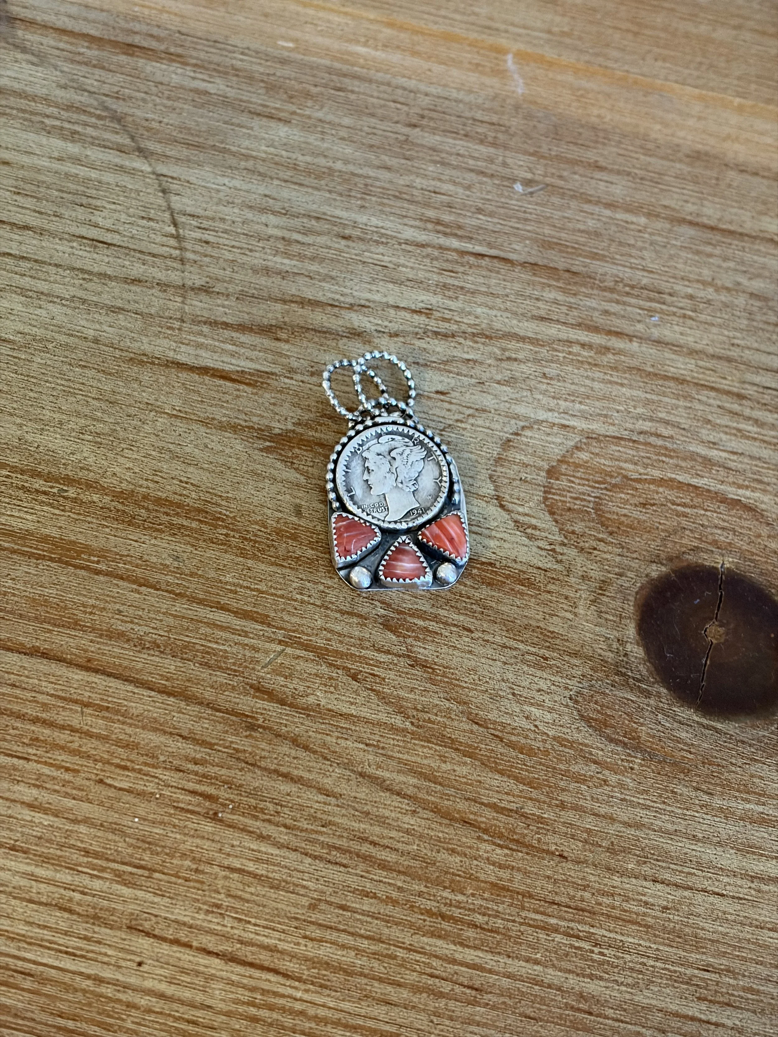 Mercury dime & red spiney oyster pendant. $88. 