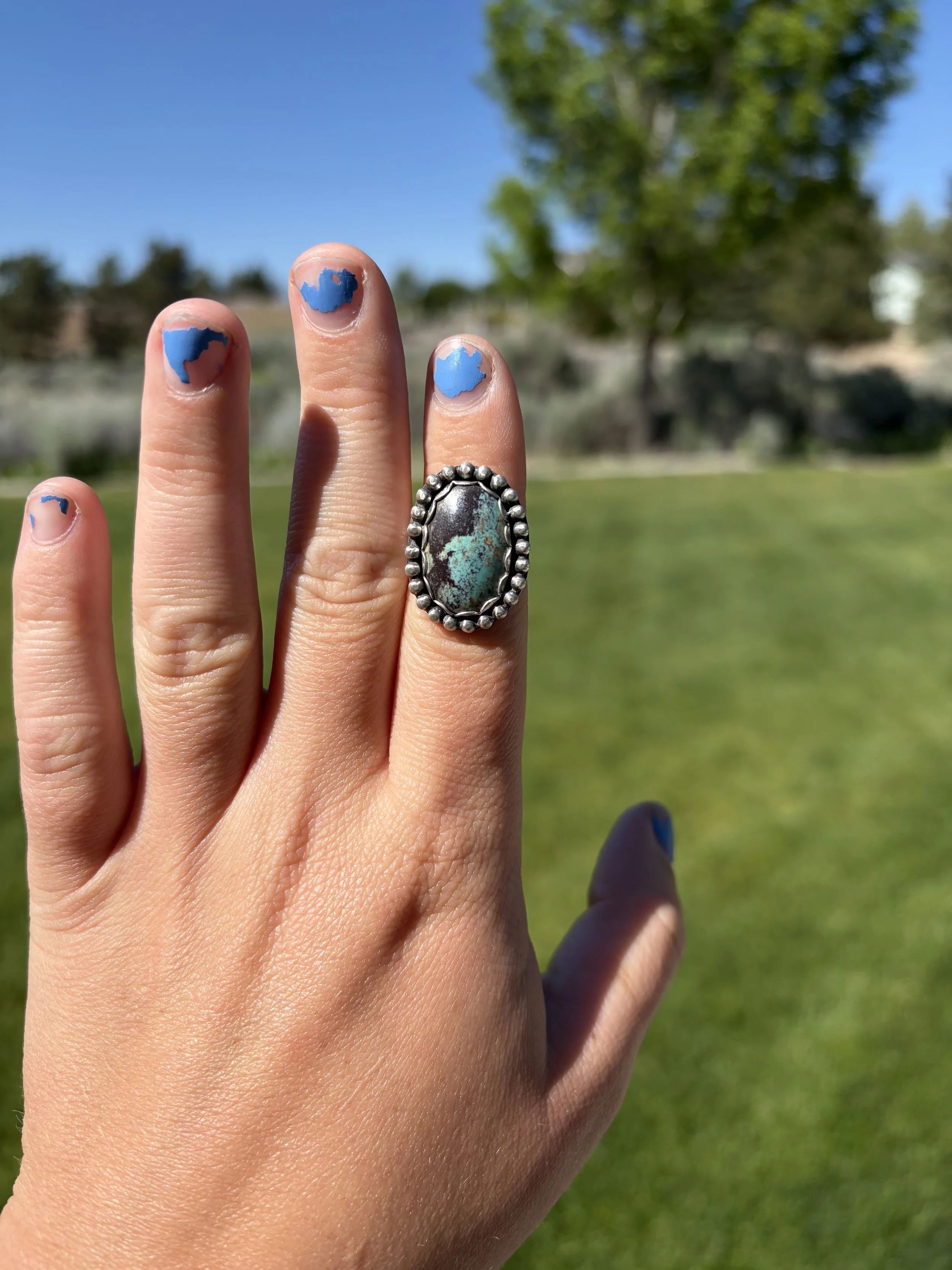 Kingman Turquoise adjustable-size ring. $70. 