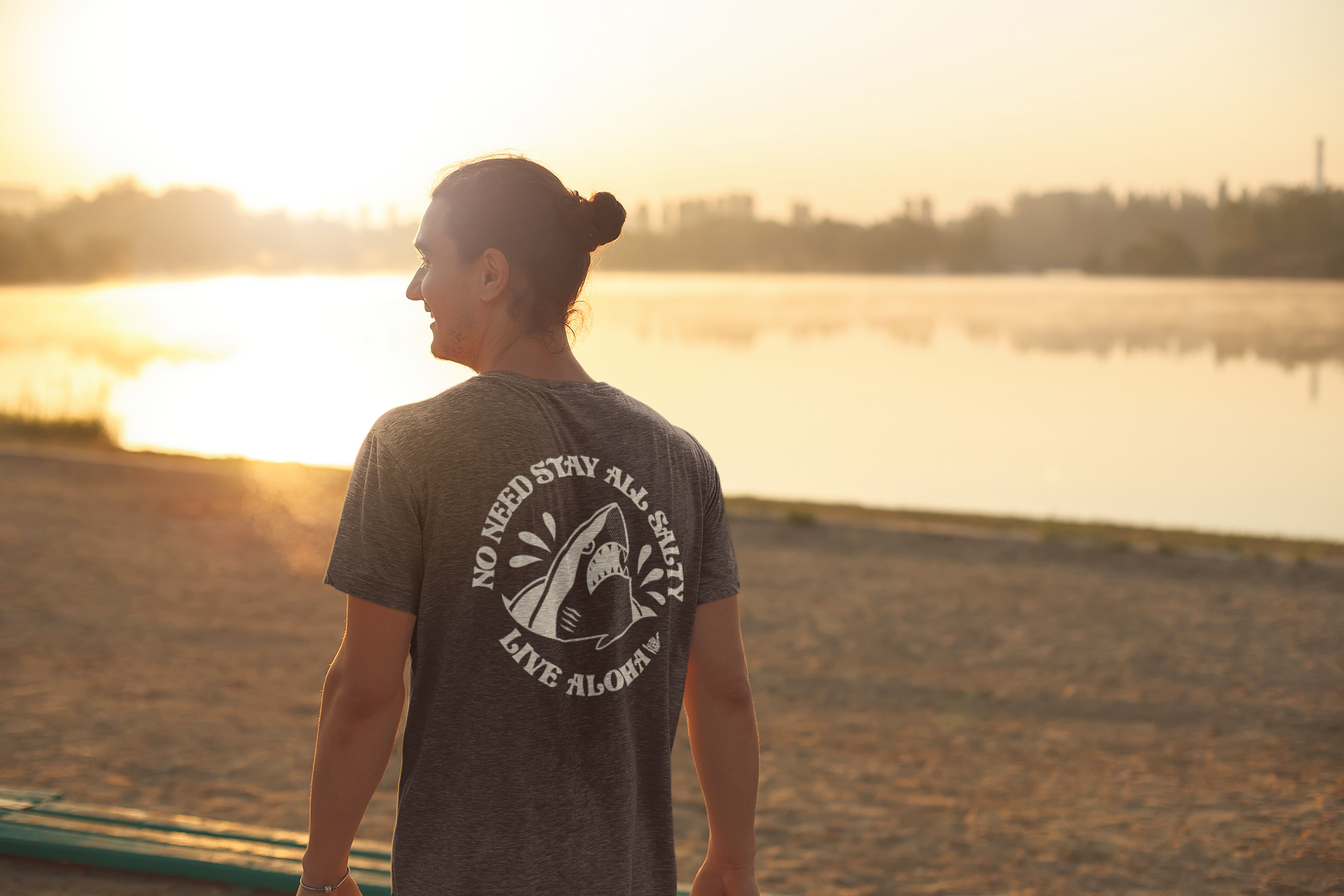 mockup-of-the-back-of-a-man-wearing-a-t-shirt-while-watching-the-sunset-39515-r-el2.png