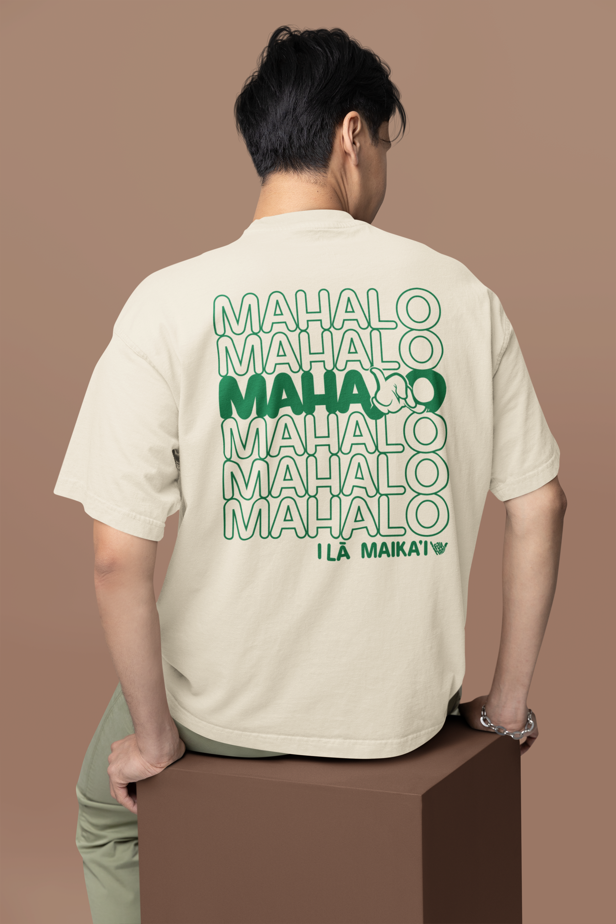back-view-oversized-tee-mockup-of-a-man-sitting-on-a-customizable-cube-m38922.png