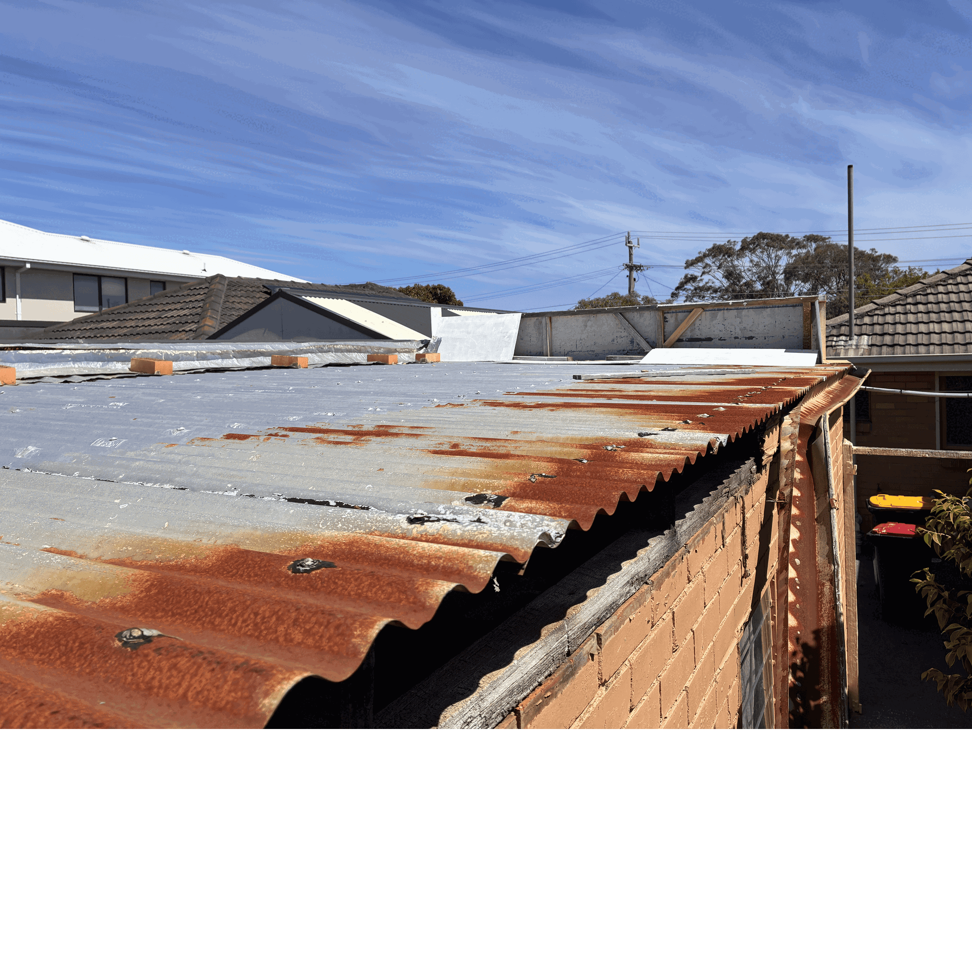 Garage roof inspection and preparation works to an existing corrugated metal roof prior to repair or replacement as subcontract work in Aspendale Melbourne.