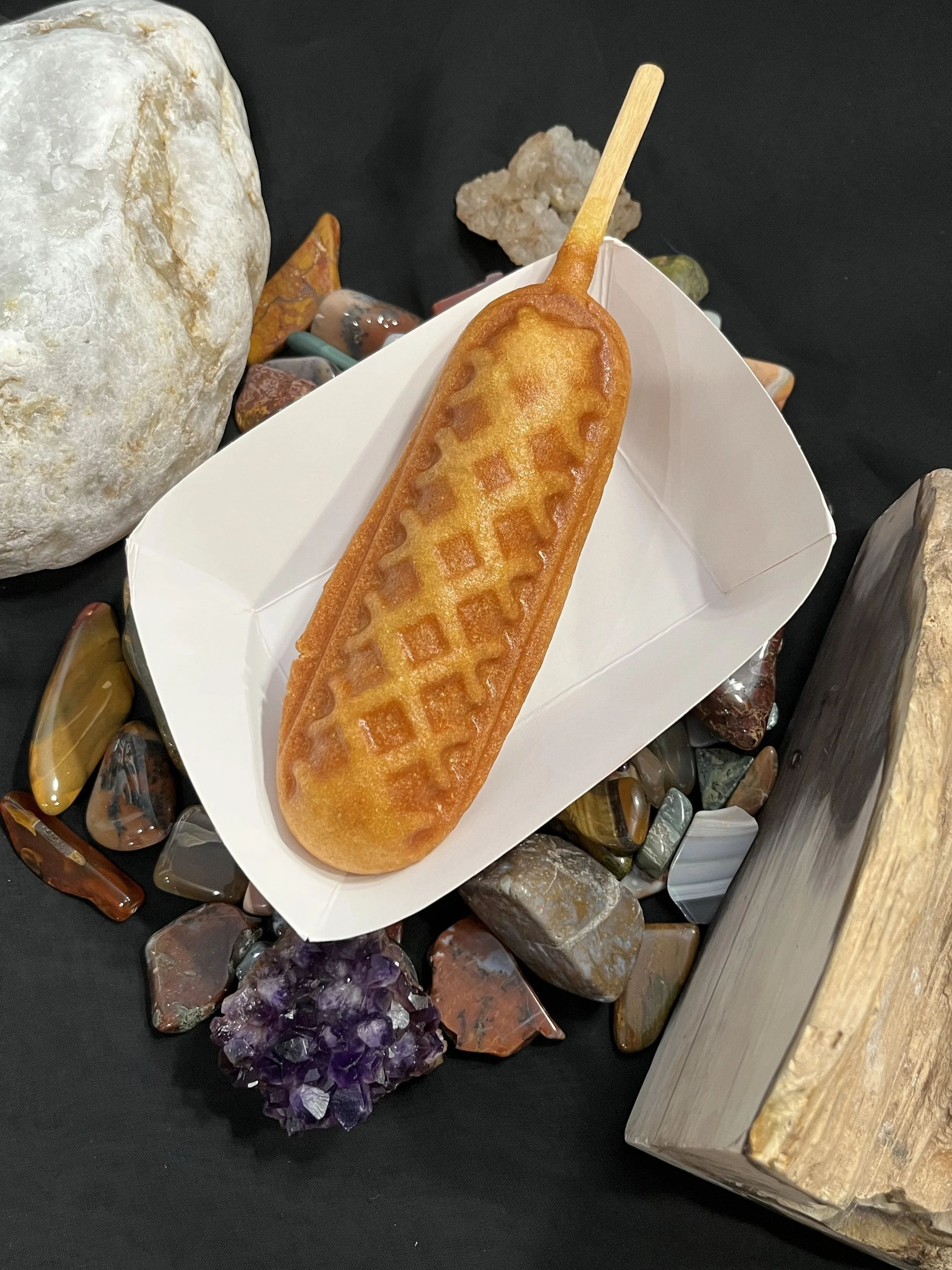 A Corn dog on display.