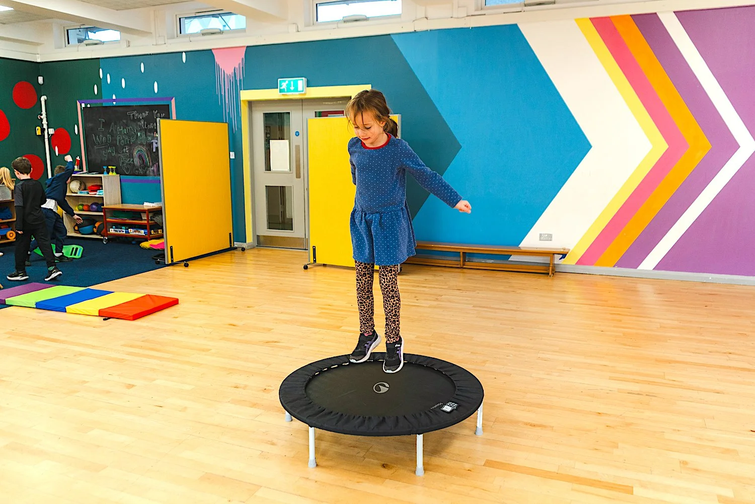 young child on a small trampoline at St. Matthew's NS.jpg