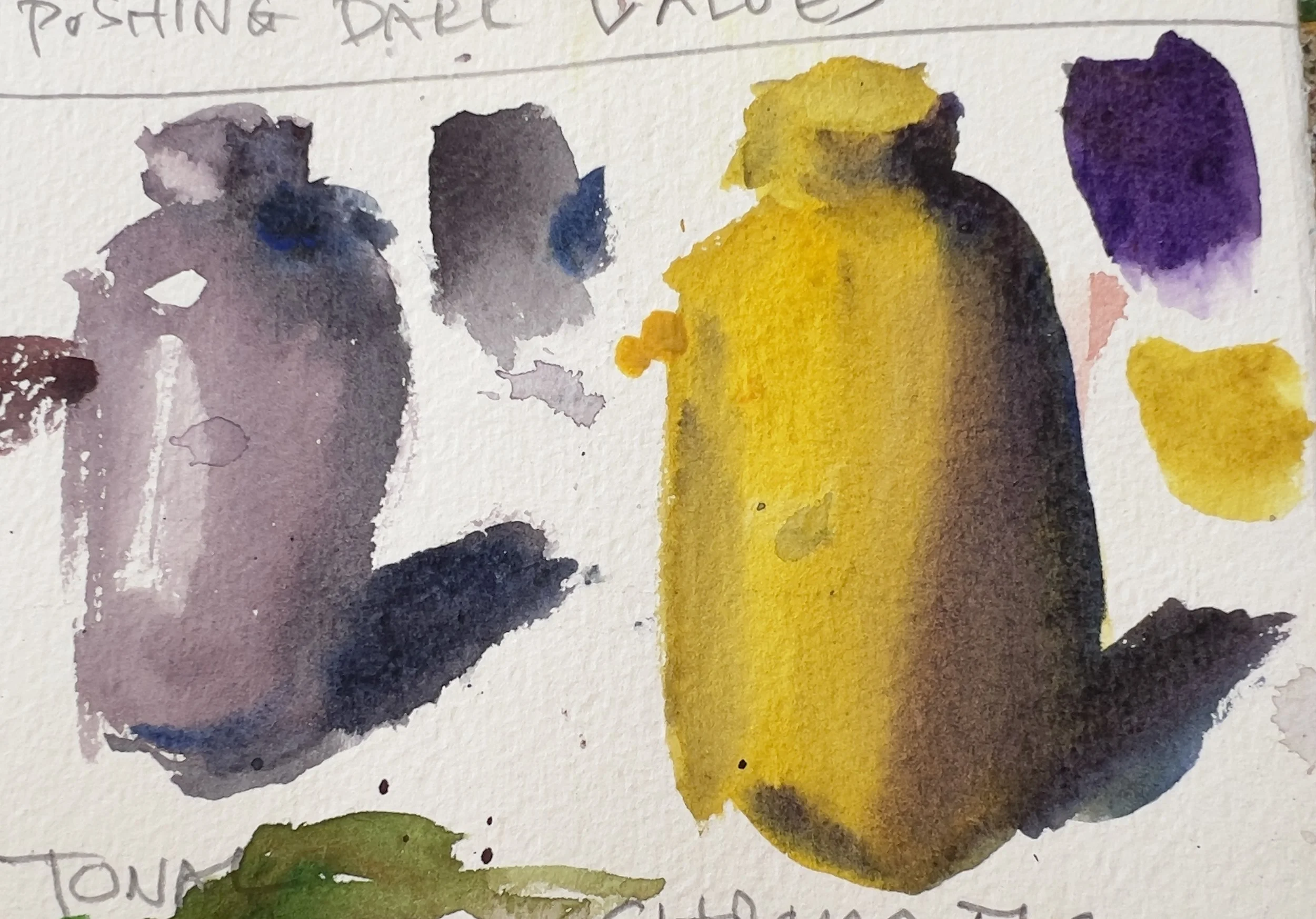 Watercolor swatches in shades of purple, black, yellow, and green on textured paper, with handwritten notes in the background.