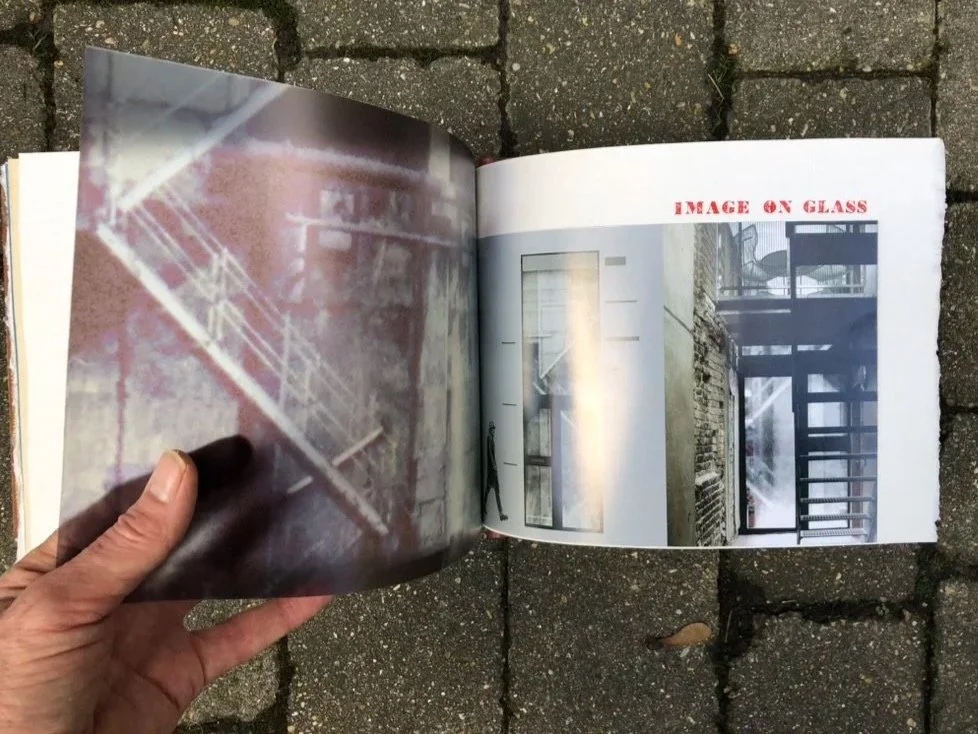 Inside spread from Cargo Fleet book showing image on glass