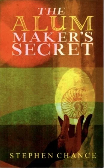 Book cover with illustration with hand holding a large golden egg with a fossil shape within