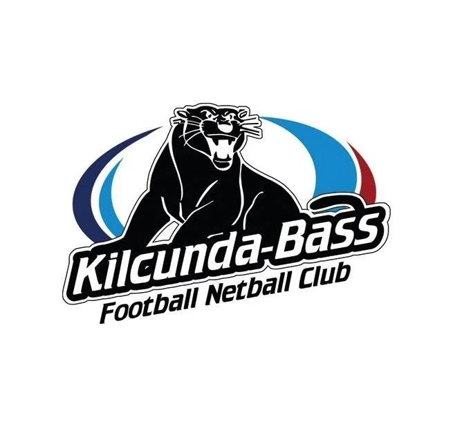 Logo of Kilcunda-Bass Football Netball Club featuring a black panther and blue, white, and red swooshes.