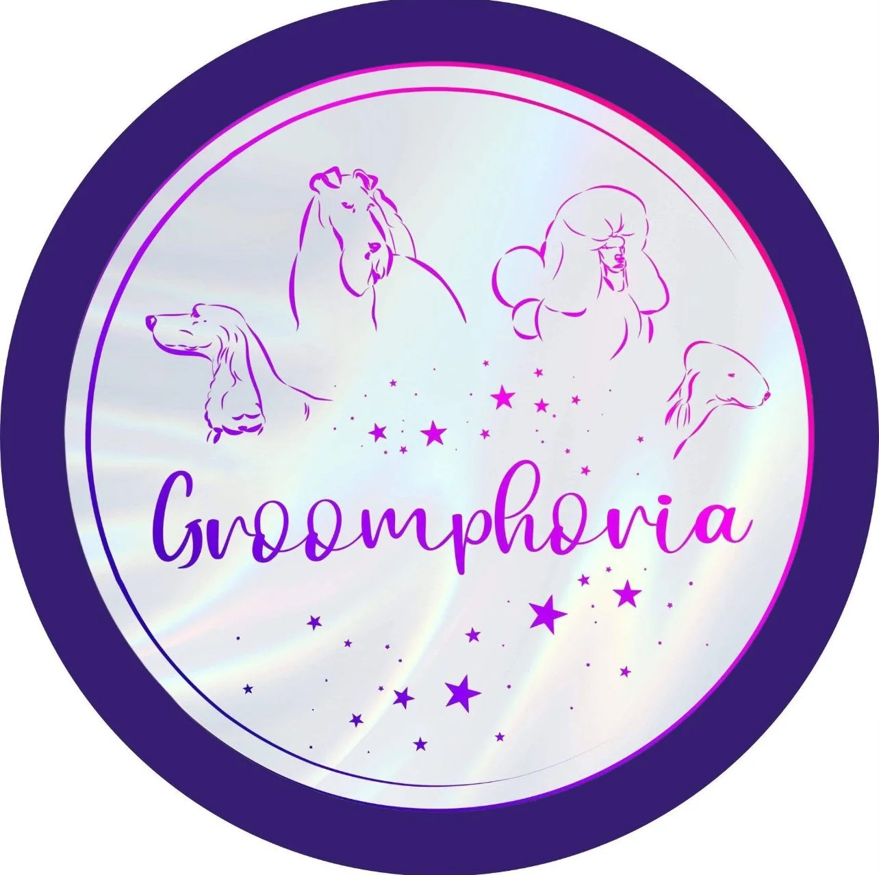 A circular logo with a dark purple border and holographic background, featuring line drawings of a lion, a woman with voluminous hair, and two dog heads. The word "Groomphoria" is written in purple cursive in the center, surrounded by stars of variou