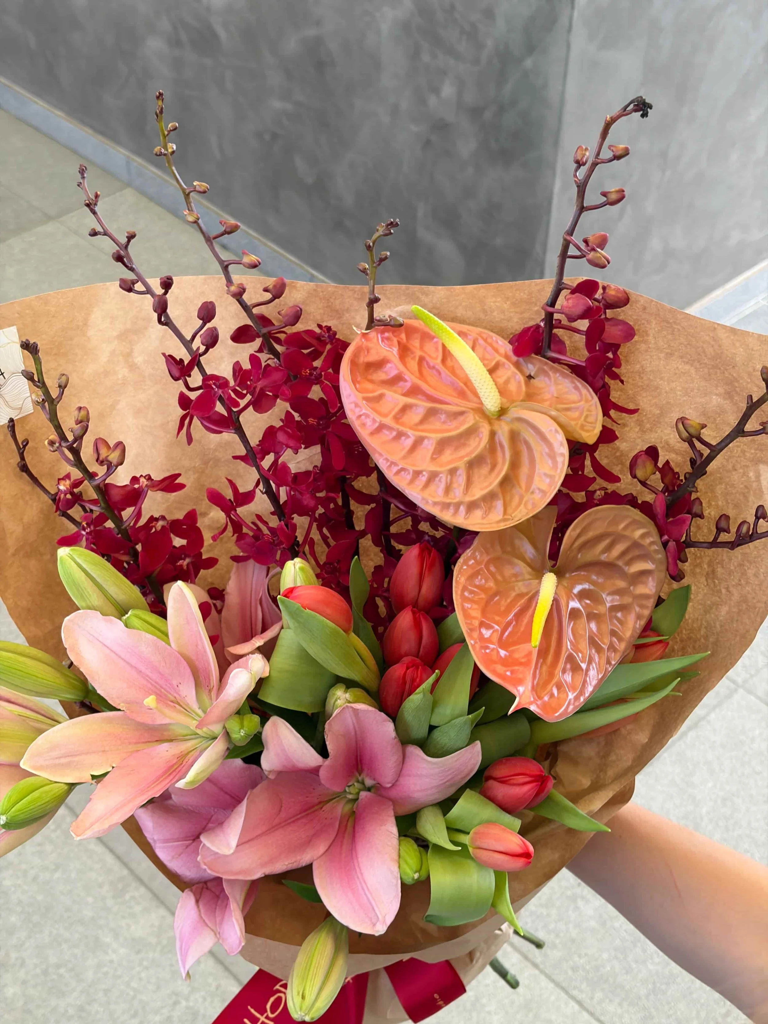 Top view of pink lily and anthurium bouquet by HORA Flowers Perth
