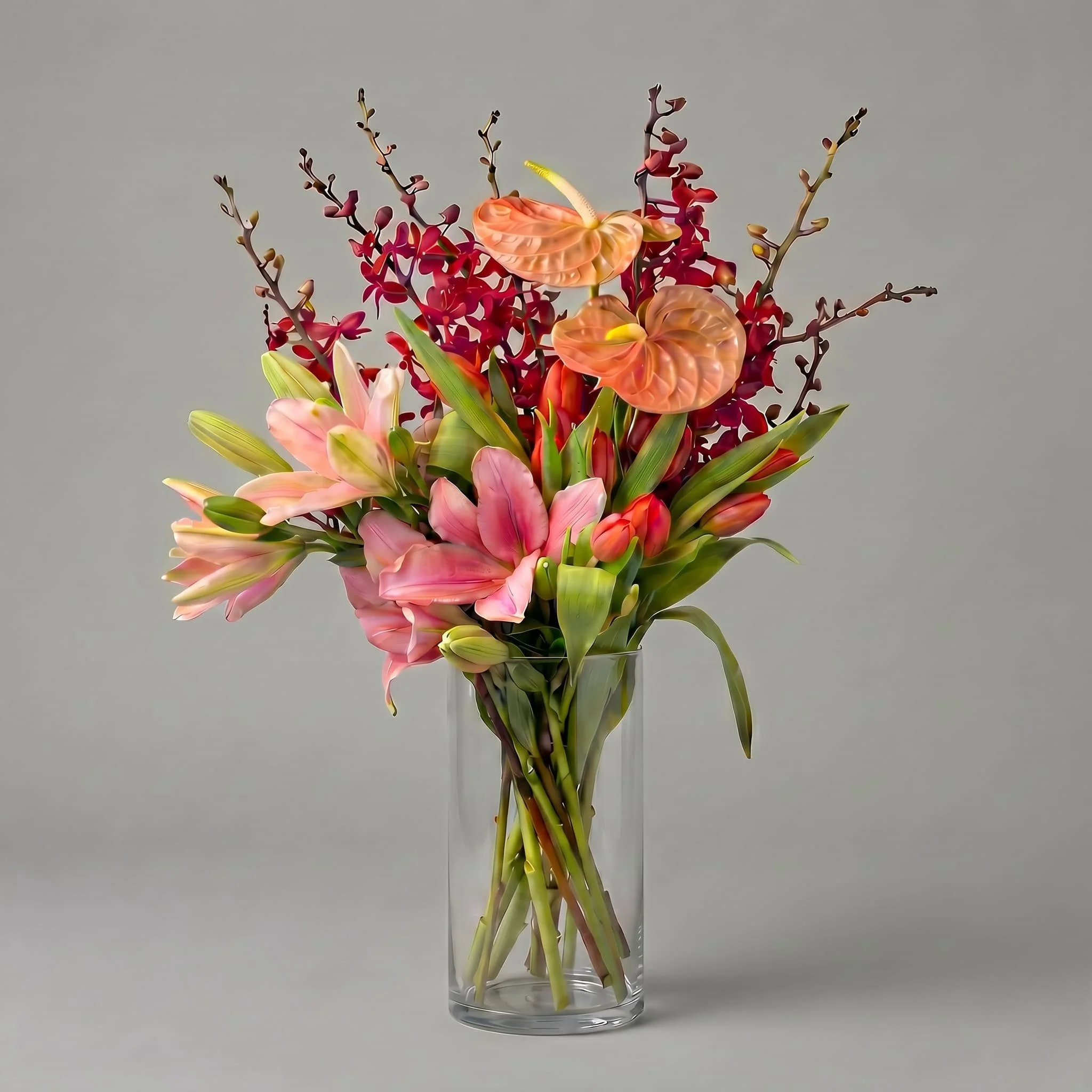 Pink lily and anthurium bouquet in clear glass vase by HORA Flowers Perth