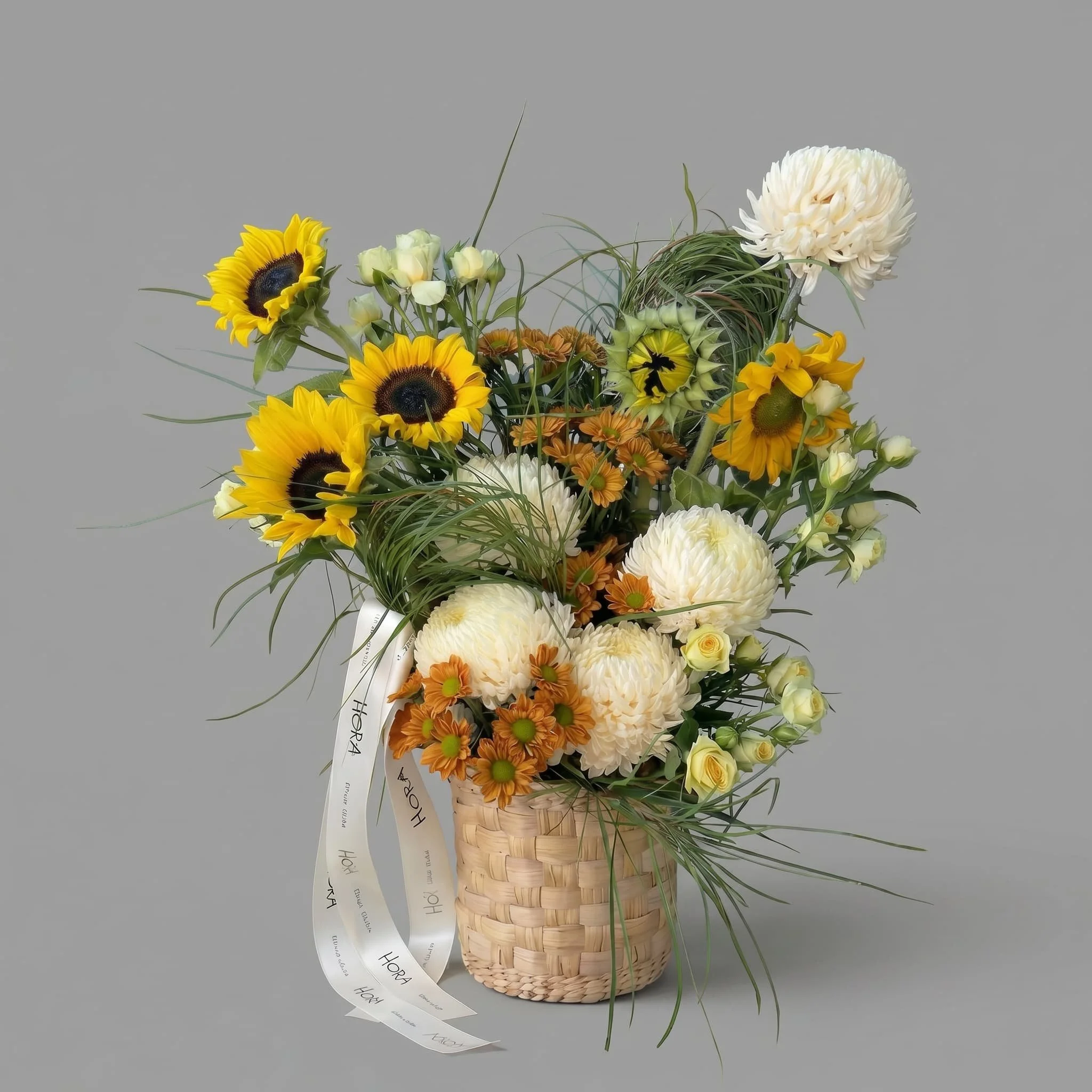 Sunflower basket arrangement with white chrysanthemums, yellow roses, seasonal flowers, and airy greenery by HORA Flowers Perth.