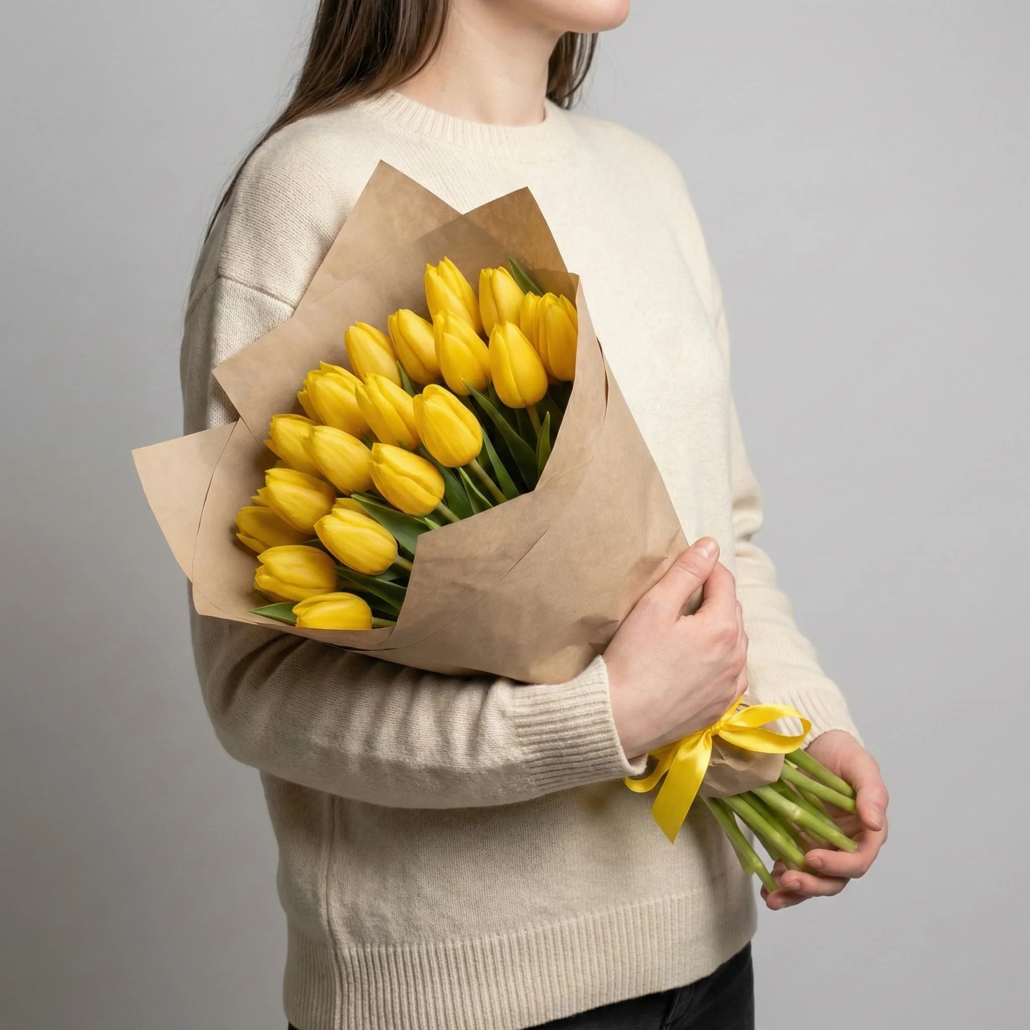 Minimal yellow tulip bouquet wrapped in kraft paper by HORA Flowers Perth