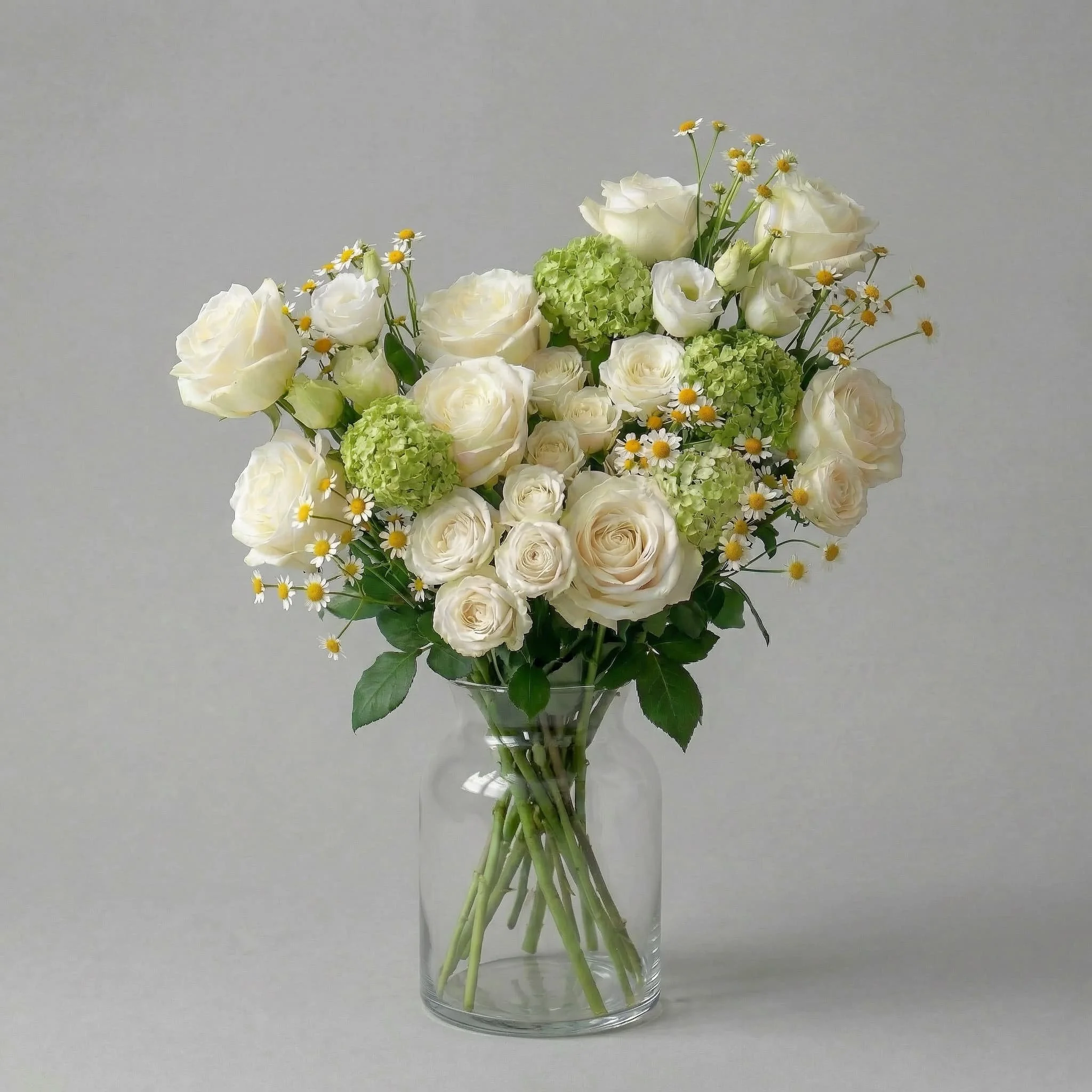 Seasonal white flower arrangement with roses and daisies styled by HORA Flowers Perth