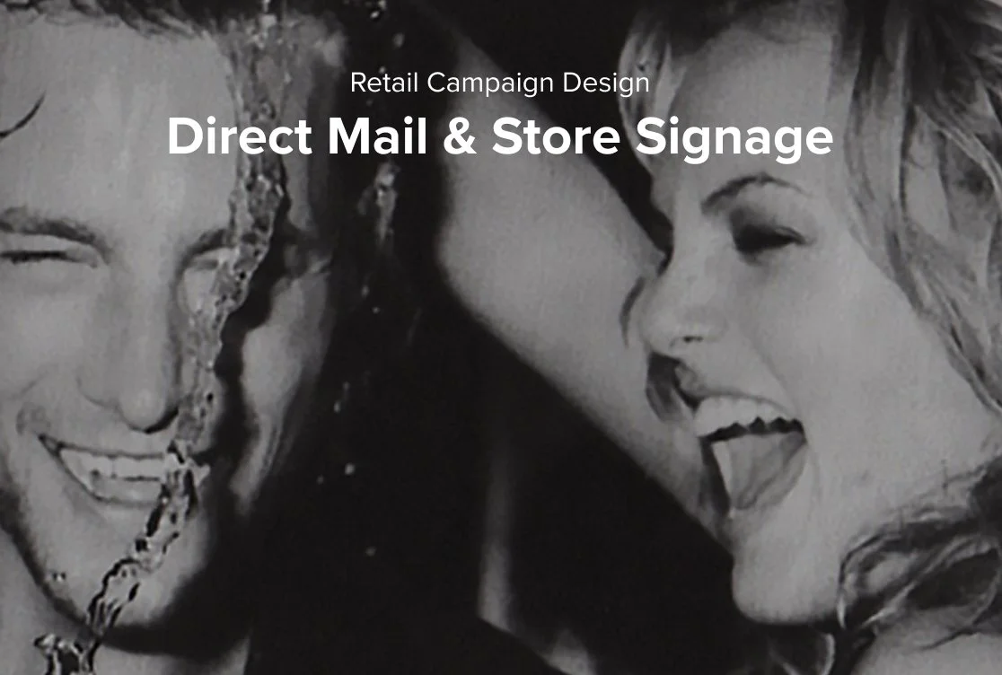 Black and white promotional image featuring two smiling women with expressive faces, for a retail campaign on direct mail and store signage.