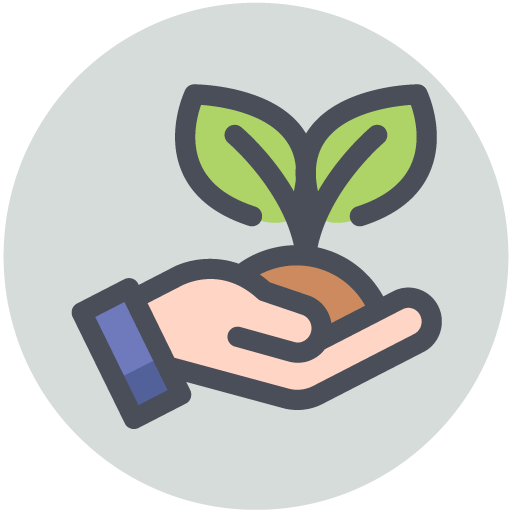 Eine Hand hält eine kleine Erde mit einer wachsenden Pflanze darauf.