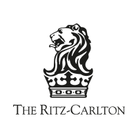 Logo of The Ritz-Carlton featuring a lion crest and text
