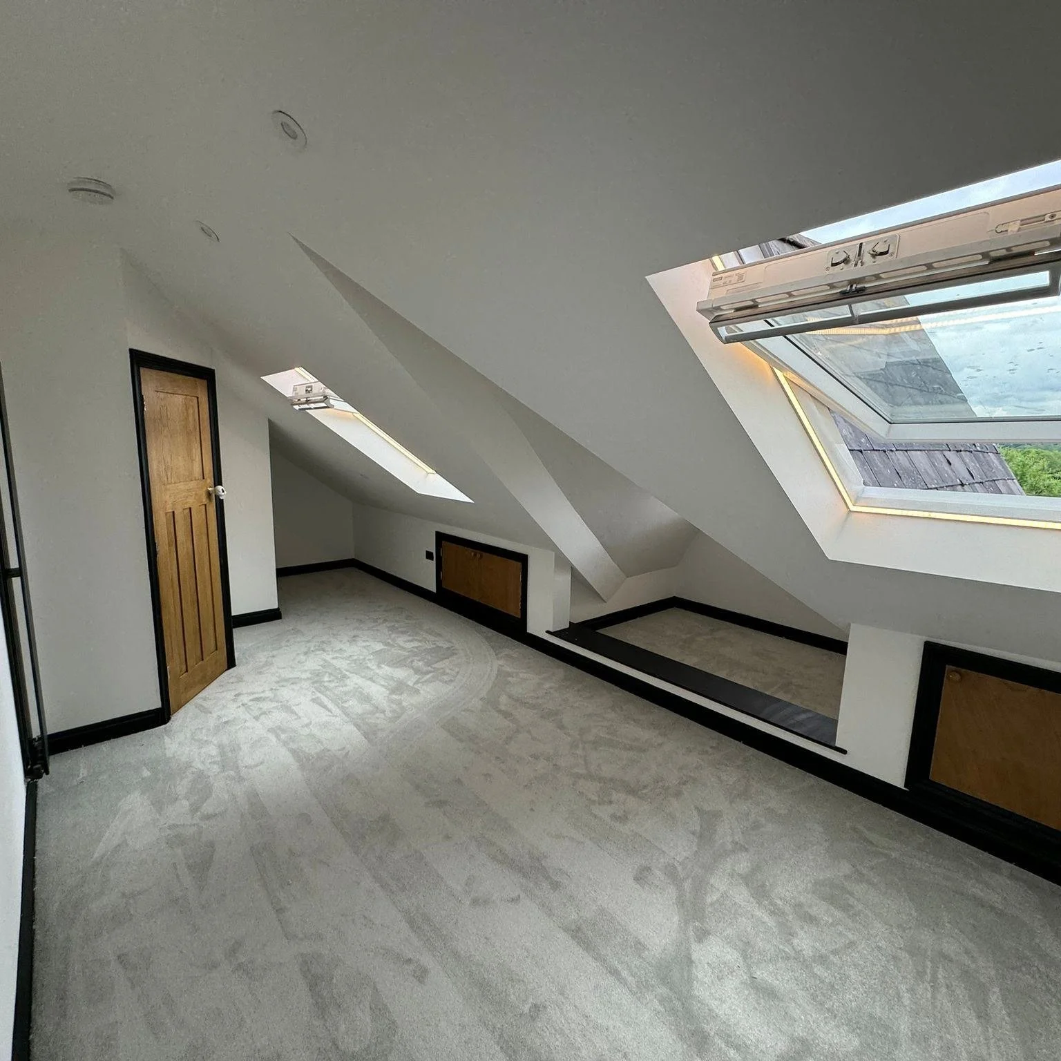 It's been a busy few months, and we're excited to share a new project update! Here's a glimpse into a recent dormer loft conversion, where we transformed attic space into two stunning bedrooms and a shower room.

The design utilizes the front gable t