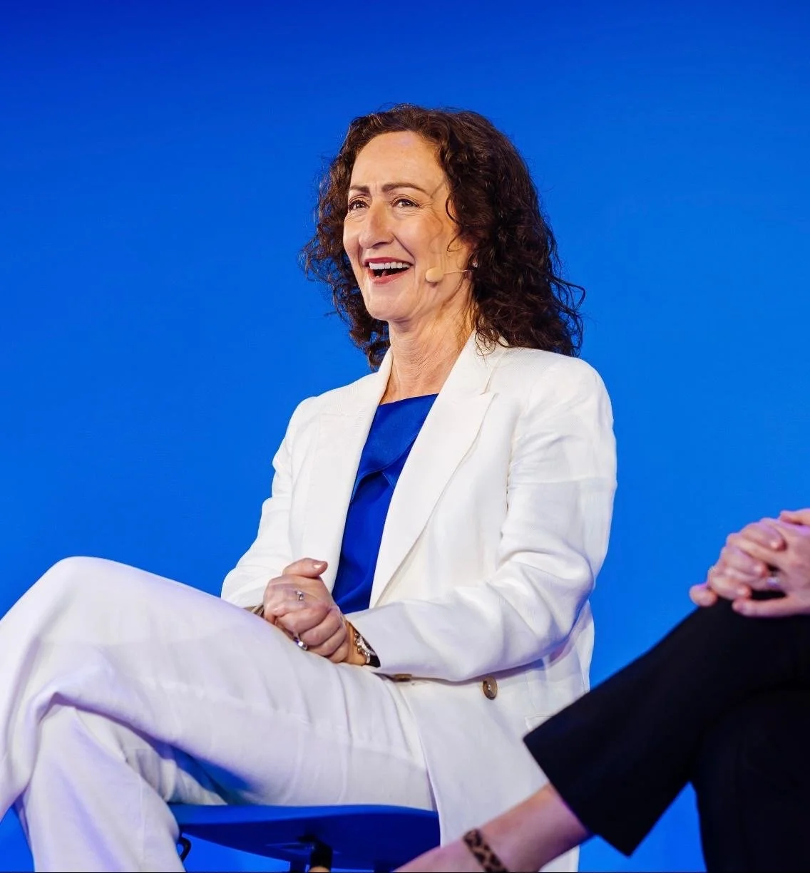 white suit laughing.jpeg