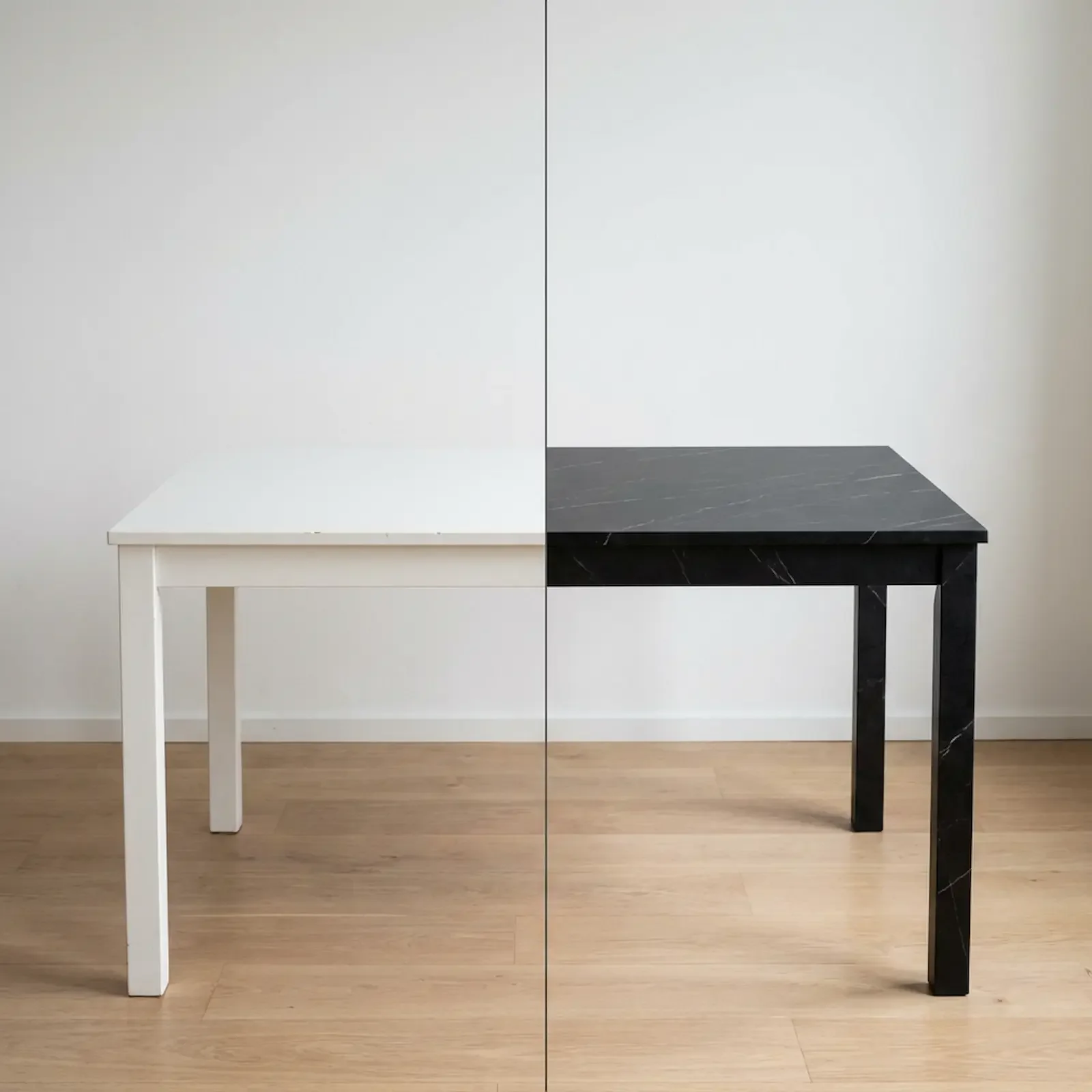 Deux tables côte à côte dans une pièce, une blanche et une noire.