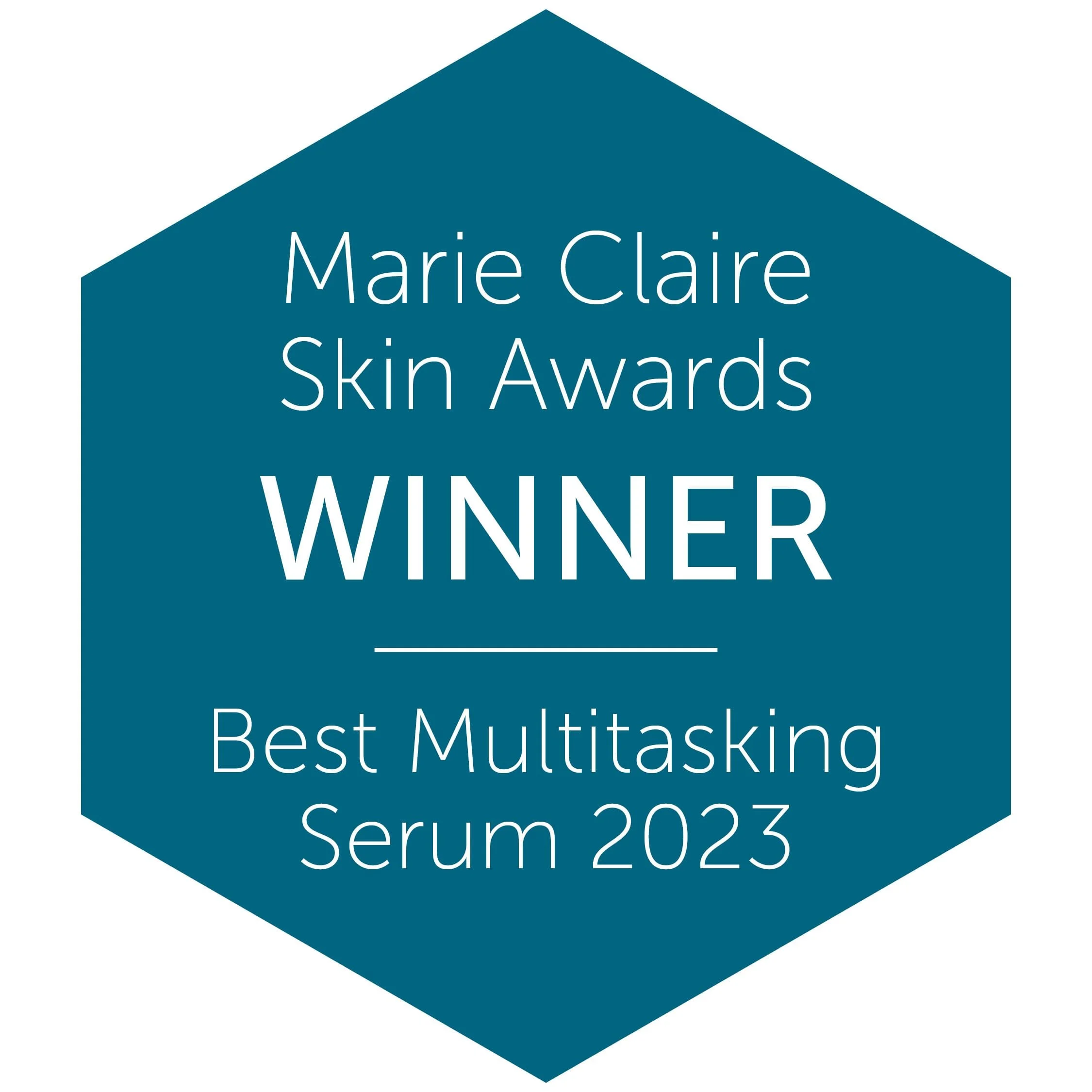 Blue hexagonal badge with white text reading 'Marie Claire Skin Awards Winner'.