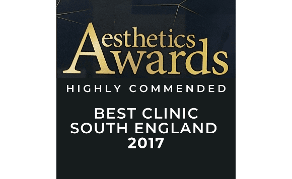 A black and gold poster for the Aesthetics Awards, highlighting the Best Clinic South England 2017 and mentioning Highly Commended.