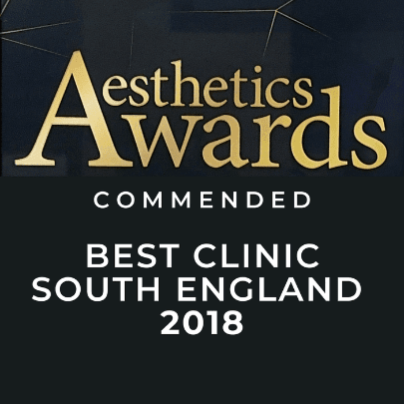 A sign announcing the 2018 Aesthetics Awards commendation for Best Clinic South England.
