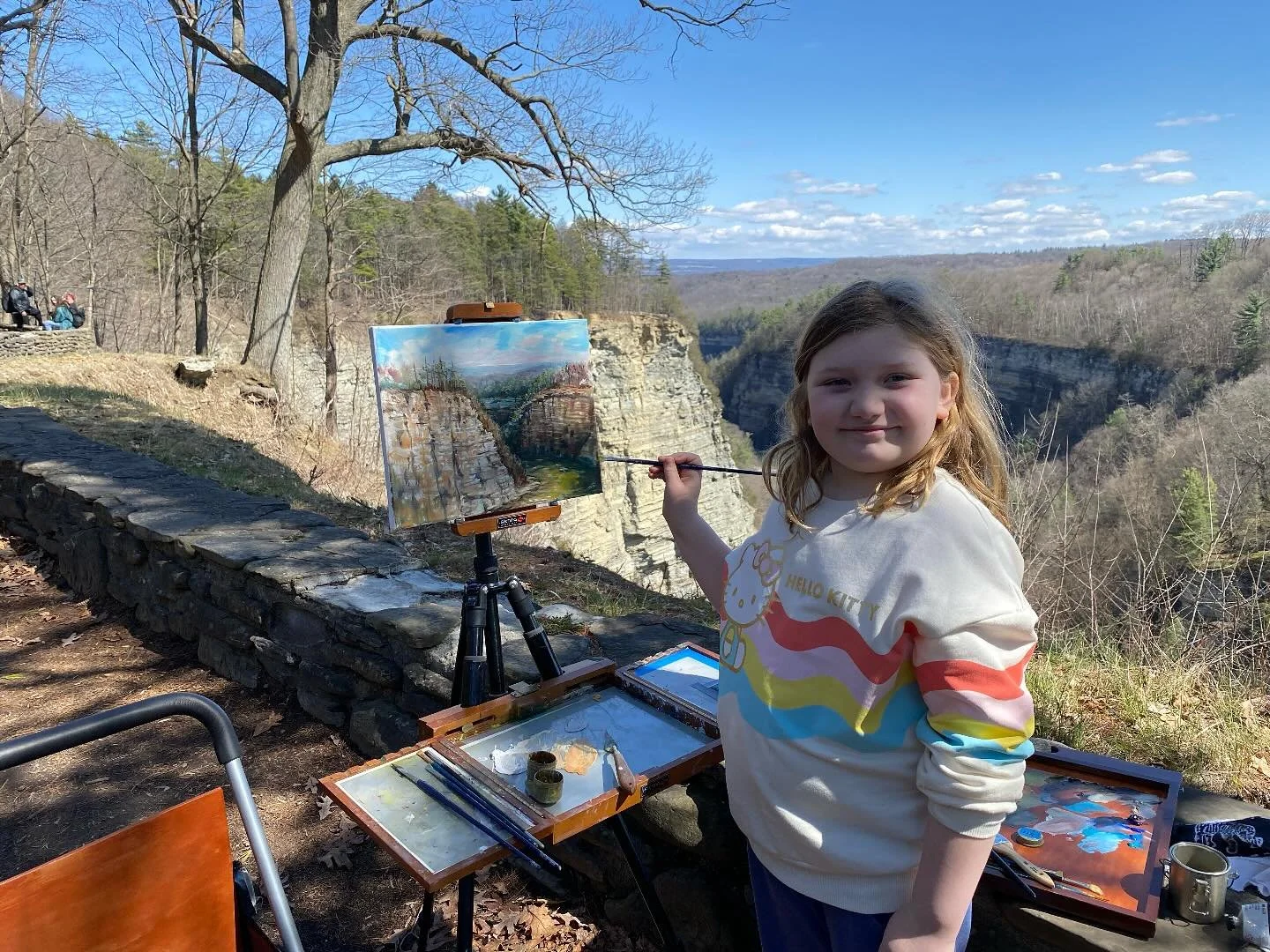 Fellow artist Bailey (3rd grade) whom I just met her and her mom helped me with some finishing touches on the river below. She was great and is now officially an oil painter !