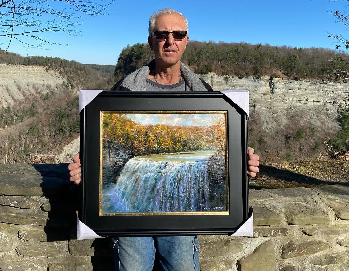 This &ldquo;Middle Falls&rdquo;painting of Letchworth St Park NY,  is going to the home of Marie and Dennis (shown picking up today). The overlook behind Dennis is the area I painted at today (43 degrees out and sunny) until the shade moved over and 