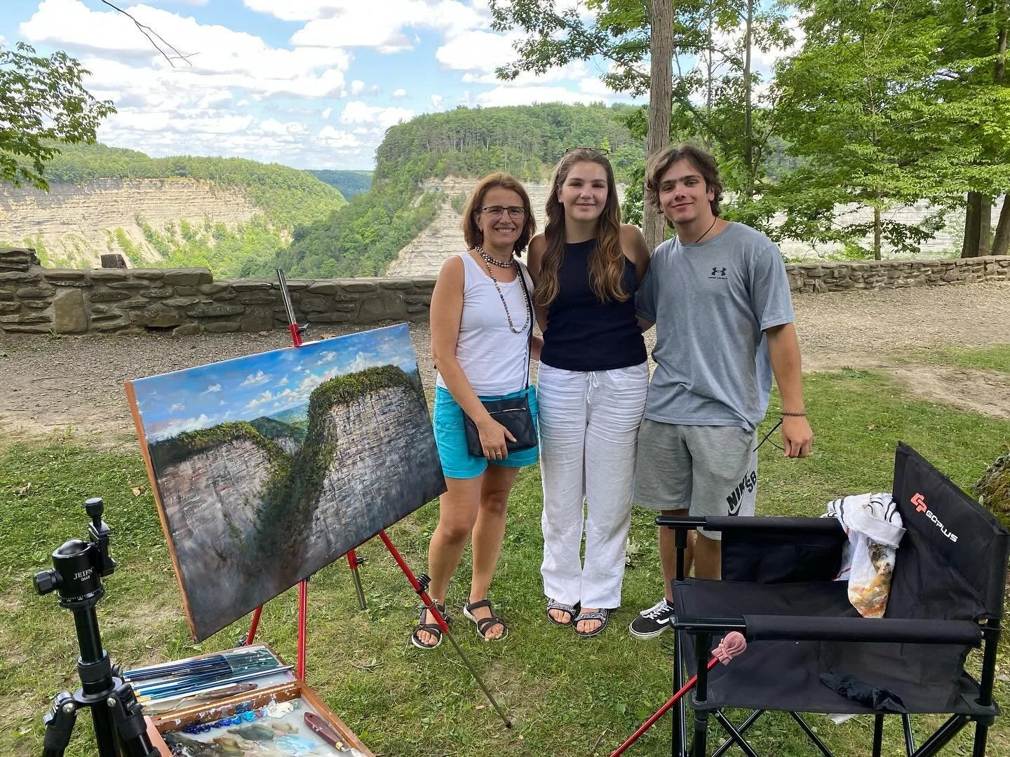 Family from Ukraine who stopped to talk about my larger version (oil on canvas) of Archery Field. Ulyana, (on the left),a professor, has a Ph.D in Management of Arts Department, Lviv, Ukraine. How impressive is that!! Hope I didn&rsquo;t bore them to
