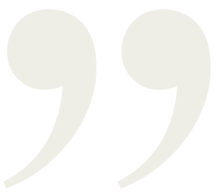 Large quotation marks on a black background