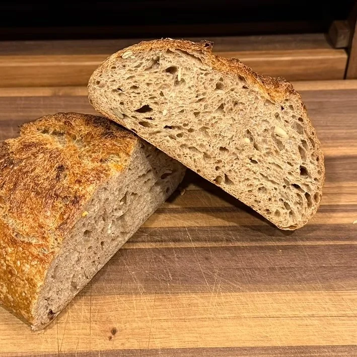  Multigrain Sourdough  Multigrain Sourdough is a hearty, whole-grain loaf packed with texture, flavor, and nourishment. Crafted with a vibrant blend of cracked rye, cracked bulgur, cracked spelt, cracked red wheat, millet, rolled oats, sunflower seed